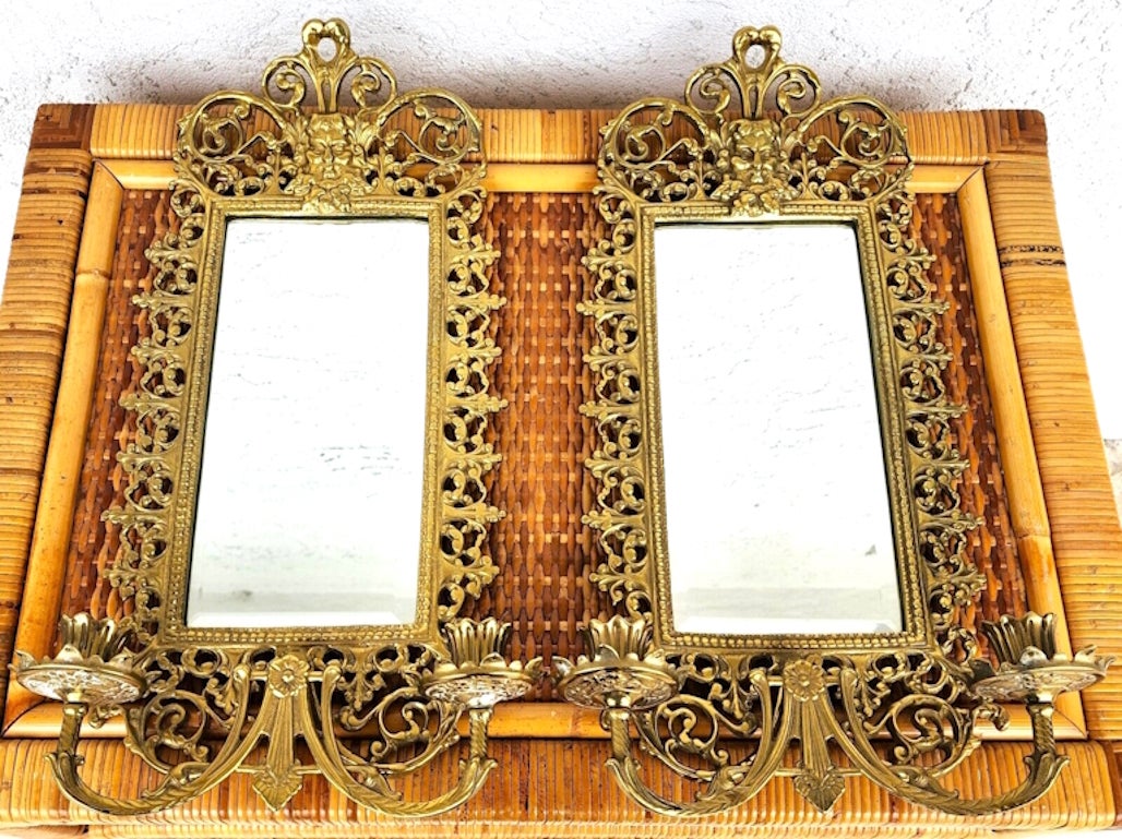 For FULL item description click on CONTINUE READING at the bottom of this page.

Offering One Of Our Recent Palm Beach Estate Fine Lighting Acquisitions Of A
Vintage Pair of Italian Solid Brass & Mirror Wall Sconces with Bacchus God Of Wine Figural