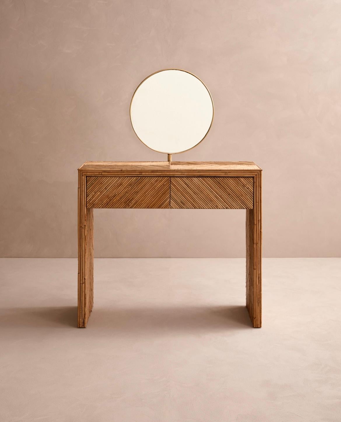 Chic bamboo vanity crafted in Italy. Quality seen in the photos. The mirror is brass. There is a drawer in the front. Perfect entry table or room/bathroom vanity. 