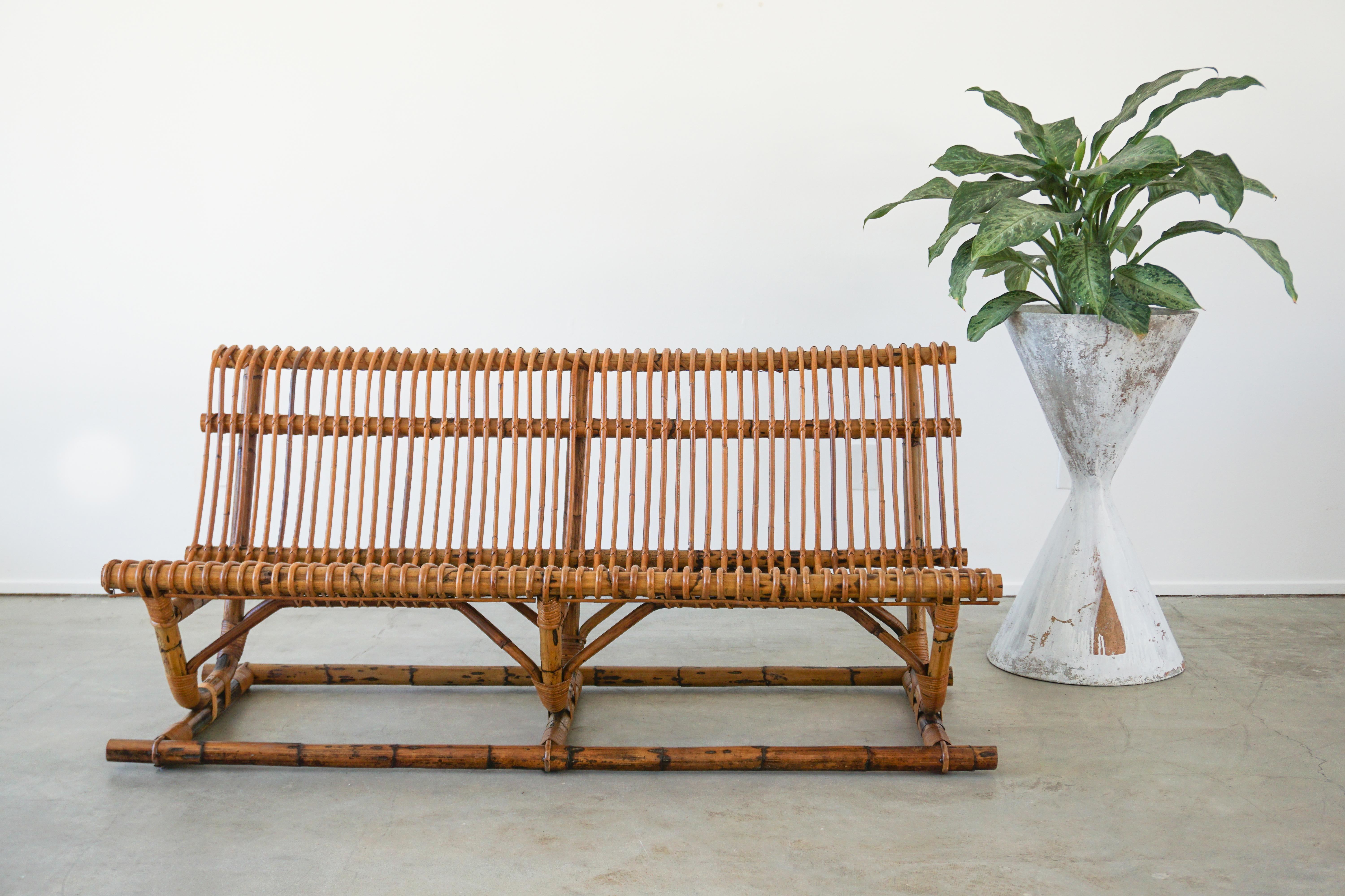 Fantastic Italian floating bamboo / rattan bench circa 1950's 
Two available, priced individually.