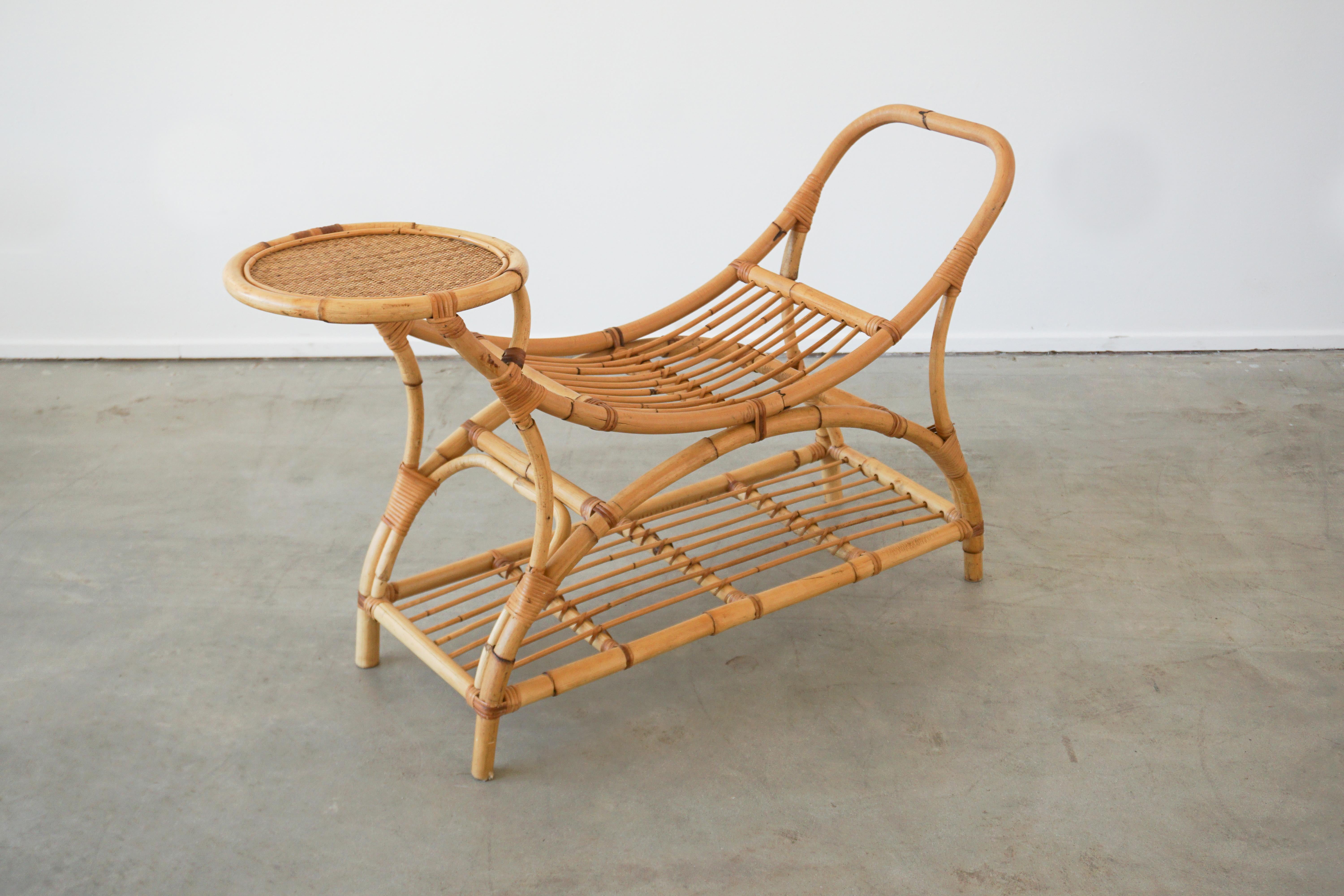 Pair of Italian bamboo benches - sculptural in shape with built in drink tables. And shelf.
Perfect for summer by the pool!
Priced as a pair.