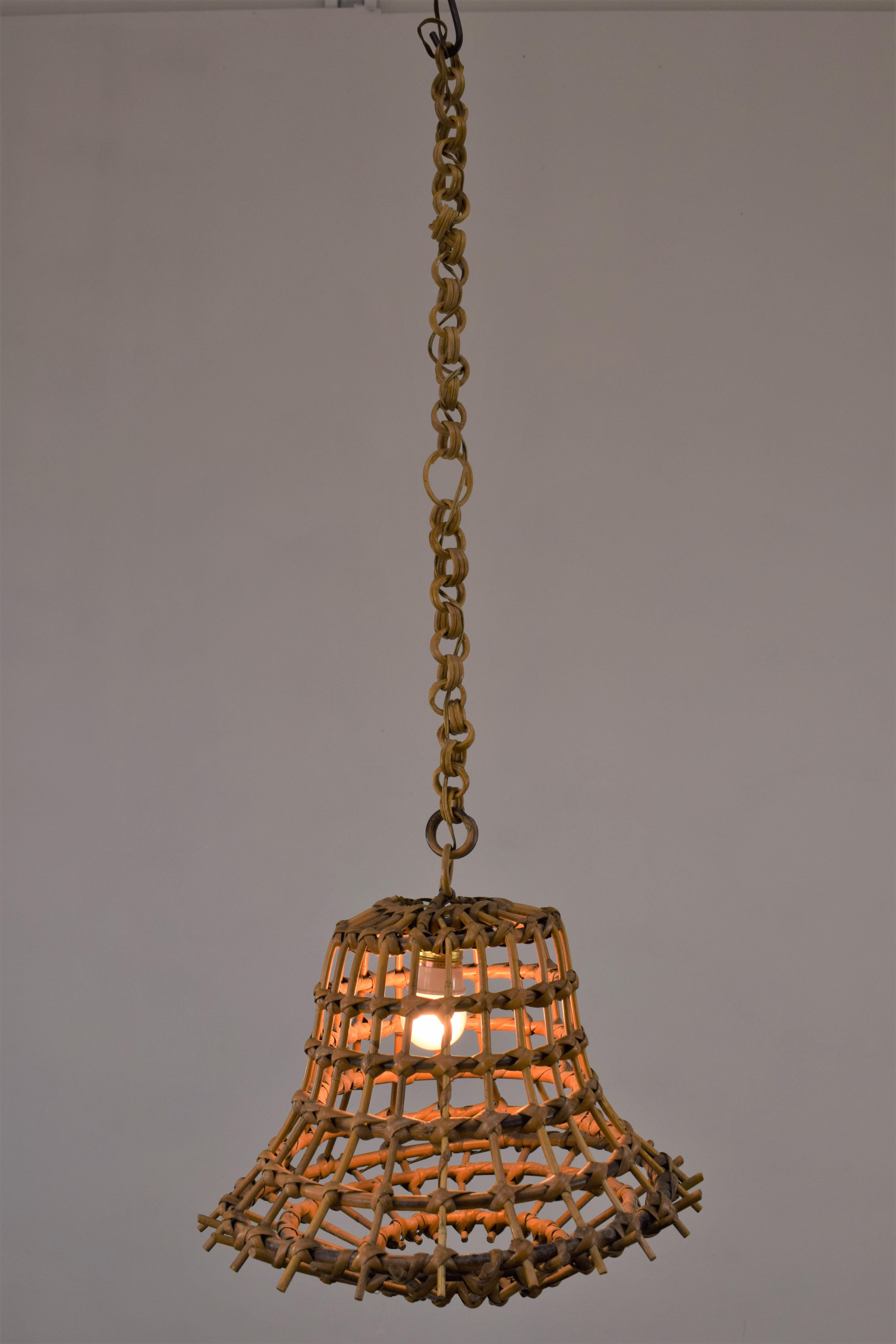 Italian bamboo chandelier, 1960s.
Dimensions: H= 87 cm; D= 36 cm.