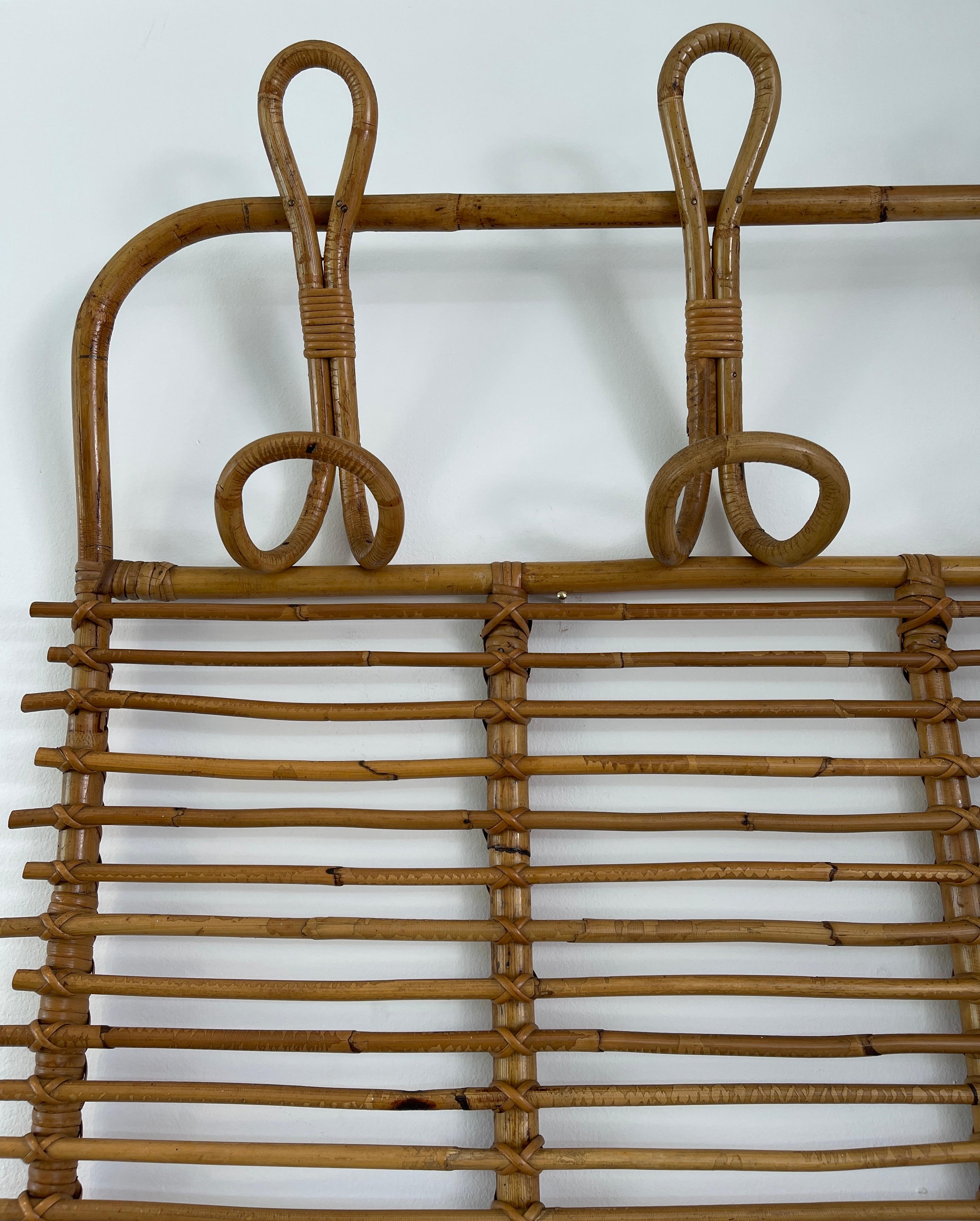 1950's Italian bamboo coatrack with 4 large double hooks. Great patina.