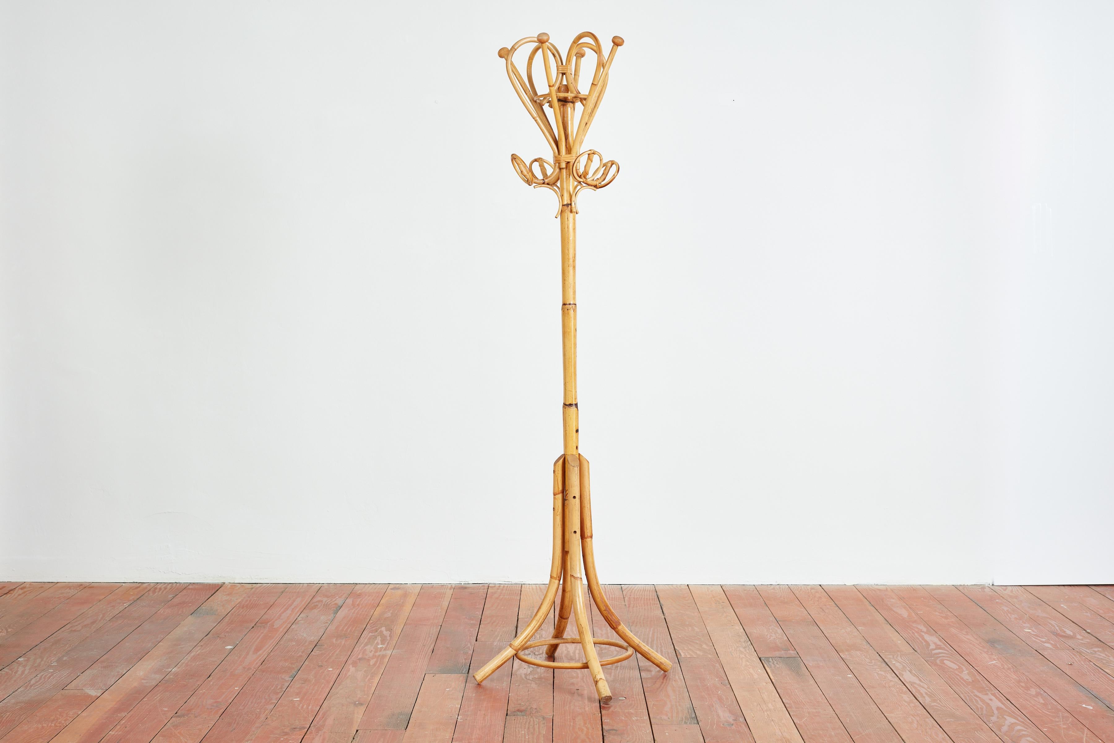 Italian bamboo coat stand with round circular hooks and wood pegs 
Sculptural shape 
Italy, 1950s