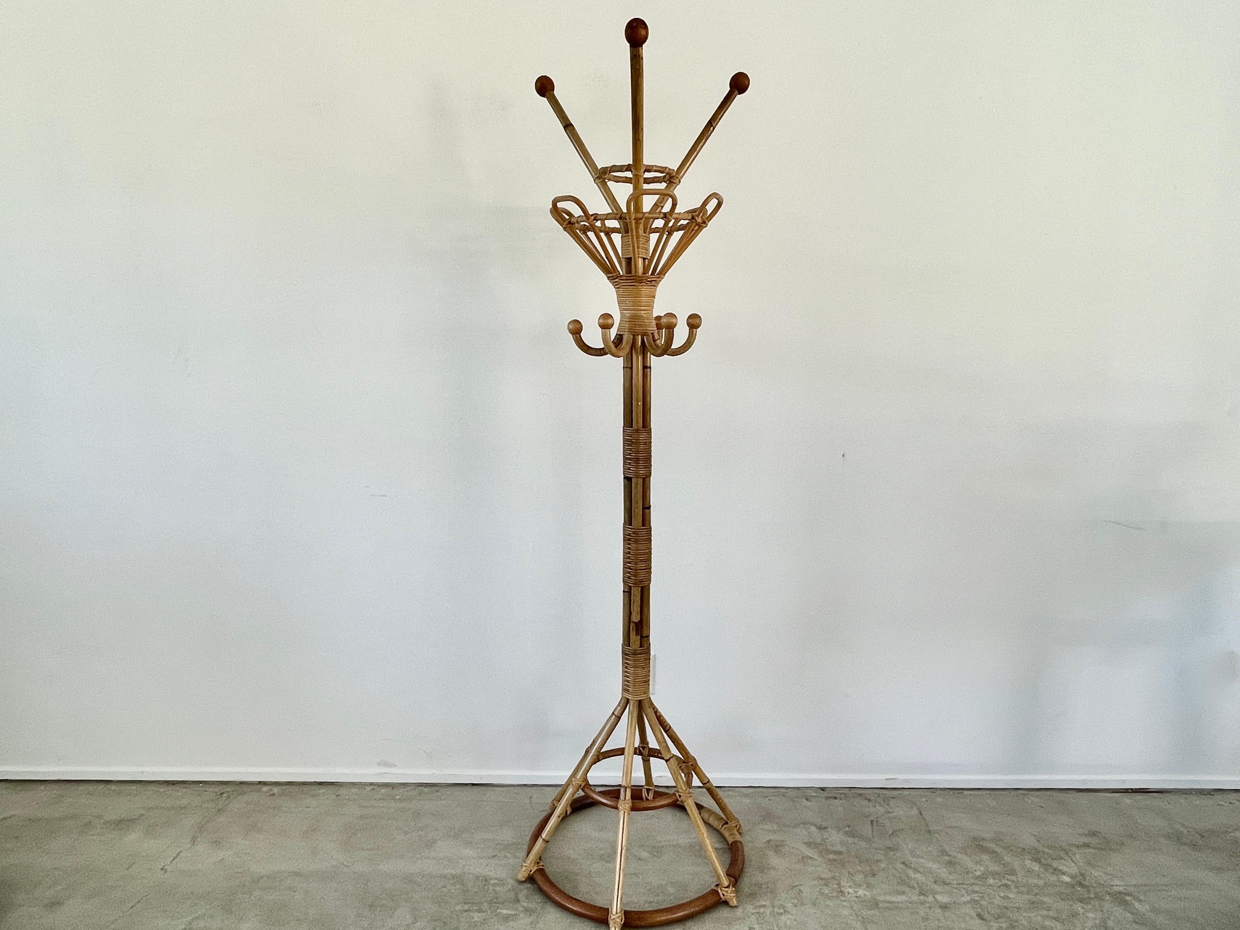 Fantastic Italian bamboo standing coatrack an what rack. 
Great scale and patina.