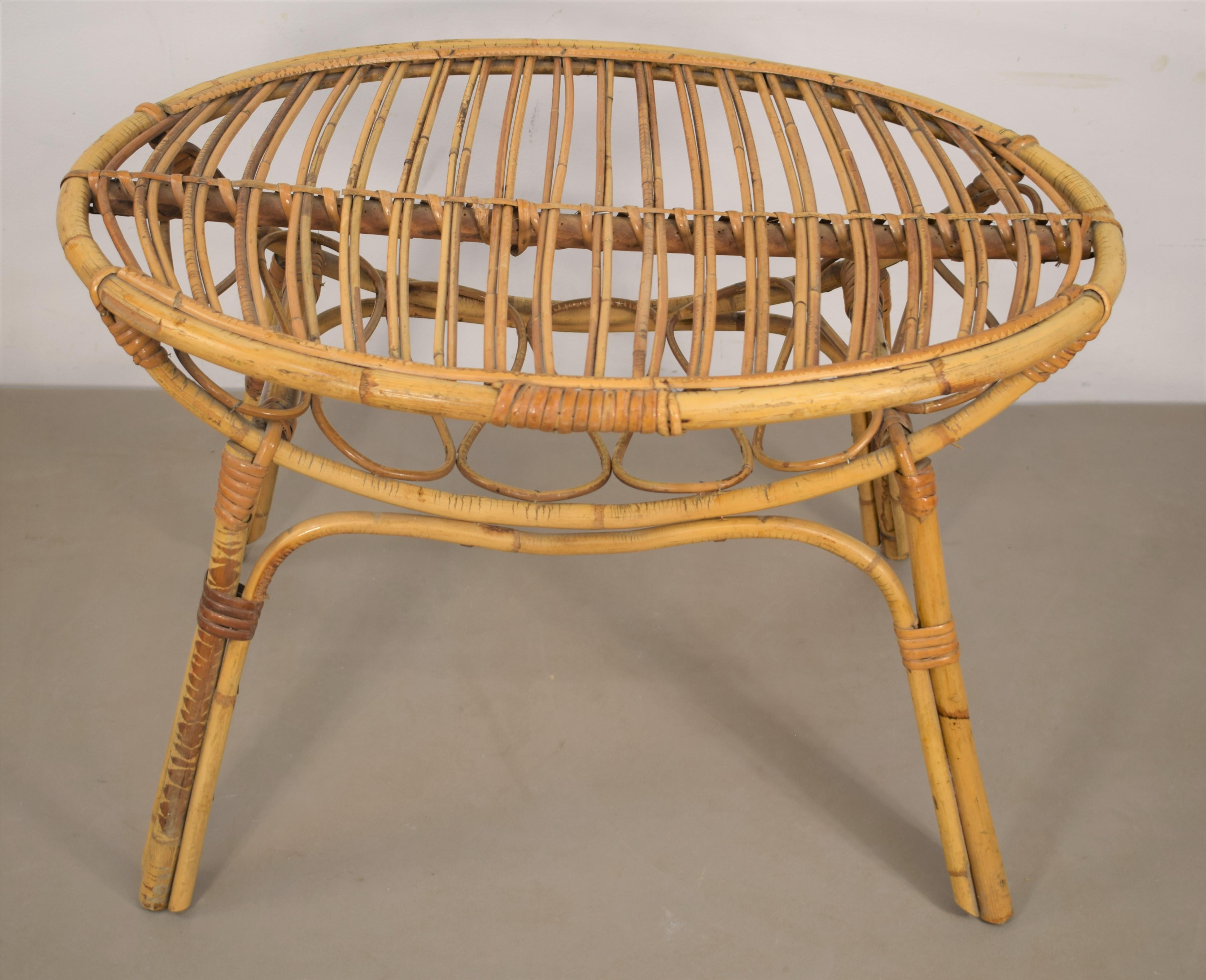 Italian bamboo coffee table with magazine rack, 1960s. 
Dimensions: H=47 cm; W= 72 cm; D=50 cm.