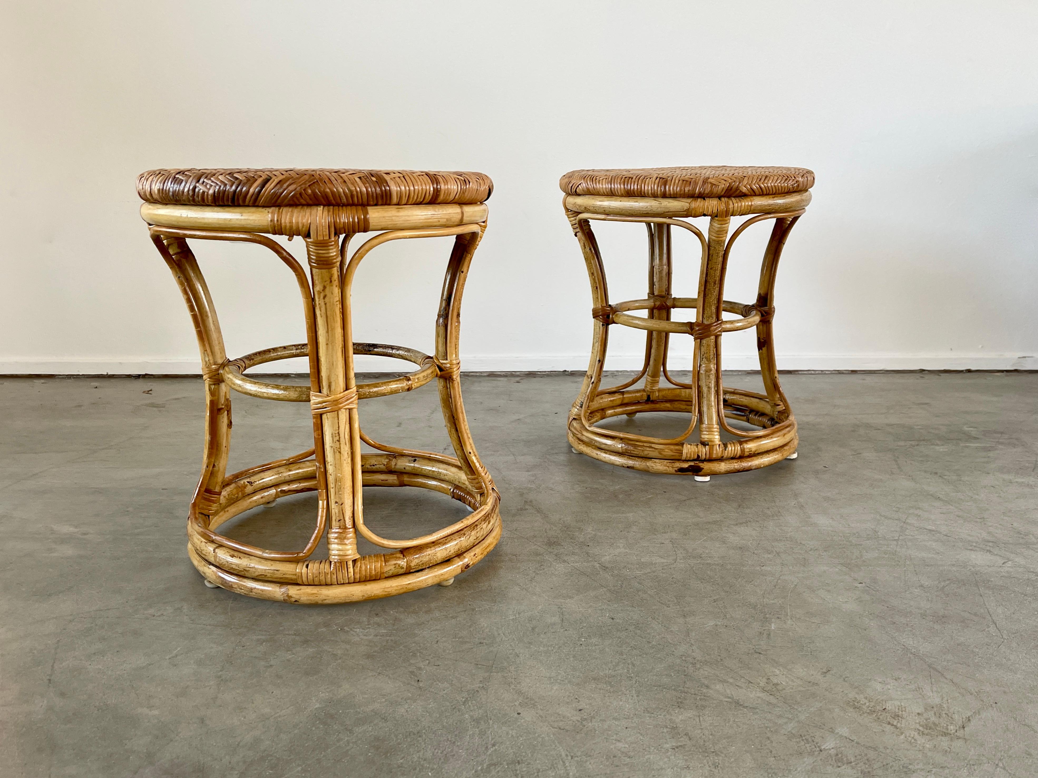 Pair of Italian bamboo stools, Italy circa 1960's 
Sculpted bamboo with woven wicker tops 
Original finish - priced individually.