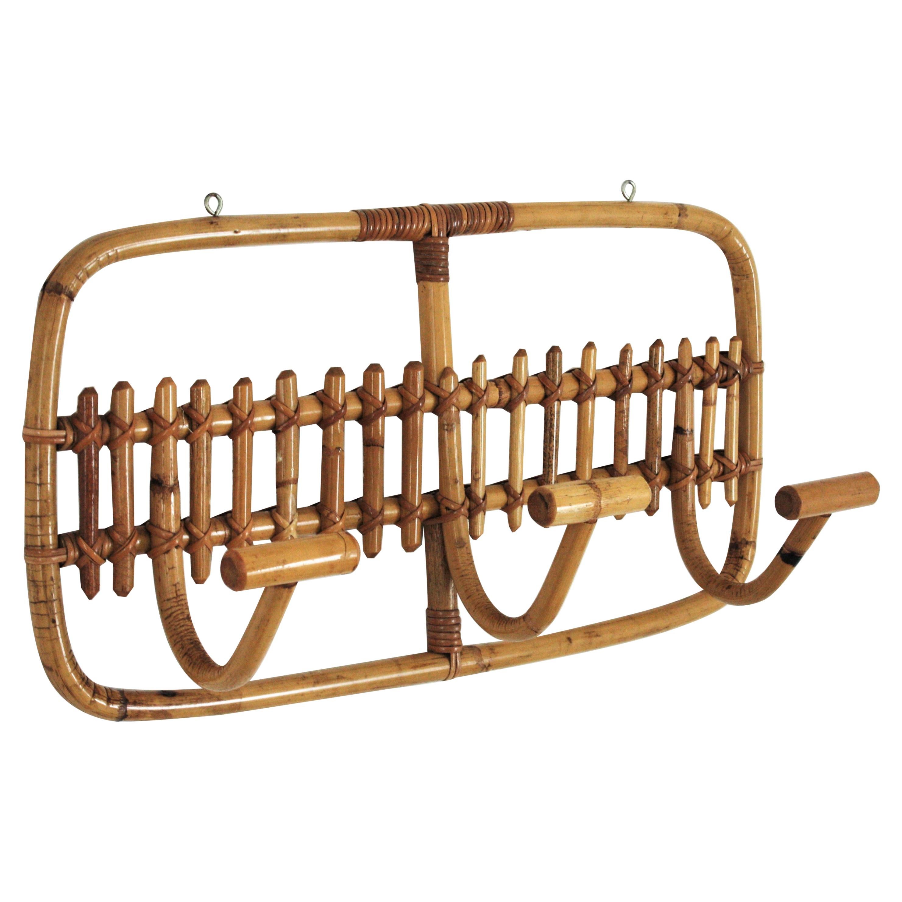 Eye-catching Italian bamboo wall coat rack stand, 1960s
Rectangular shape with 3 hooks.
It has all the taste of the Italian Riviera style.
This wall-mounted coat rack will be a nice mid-century mediterranean addition to any beach house,