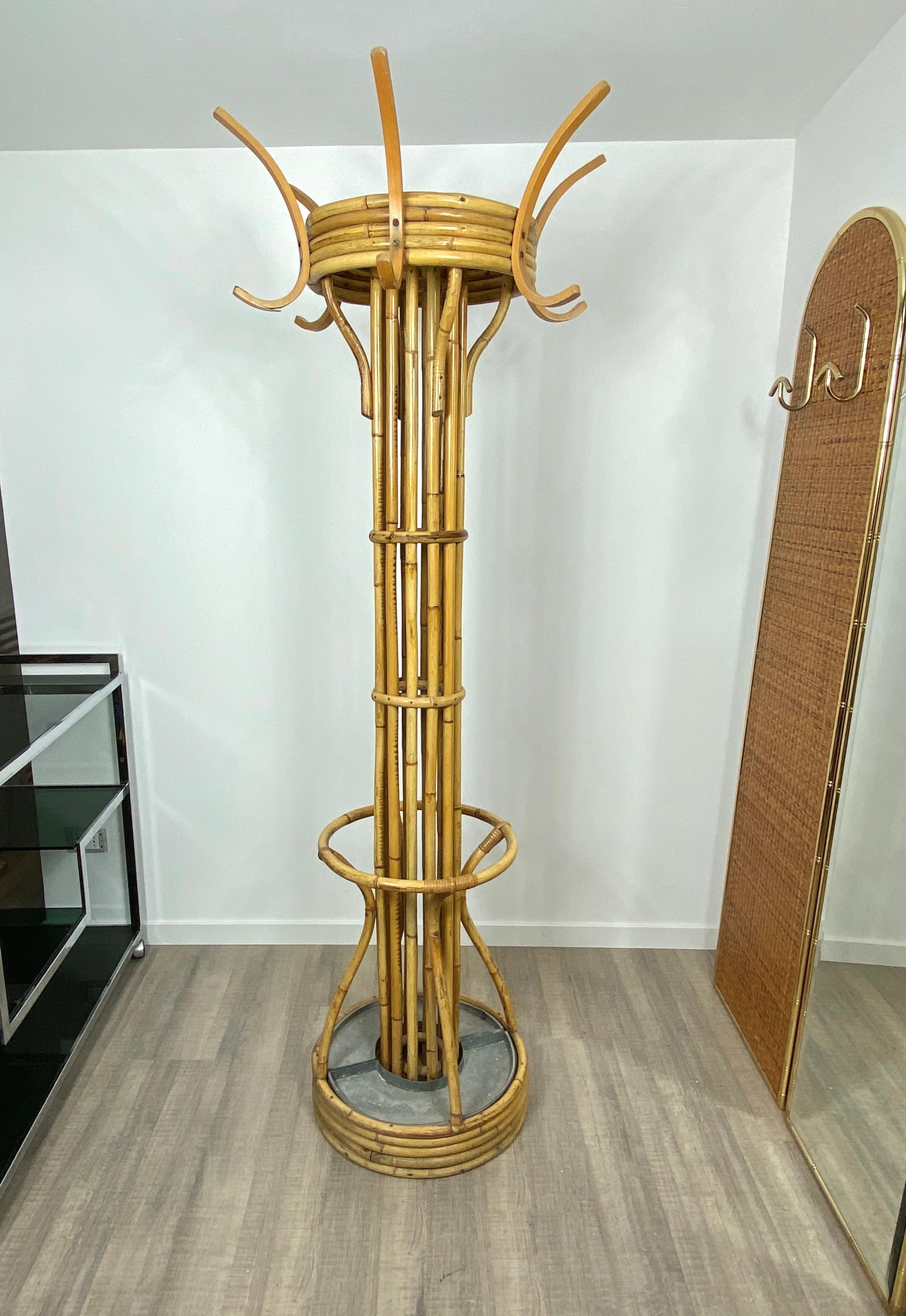 Standing coat rack and umbrella stand in bamboo,
Italy, circa 1960. As shown in the photos, the date 
