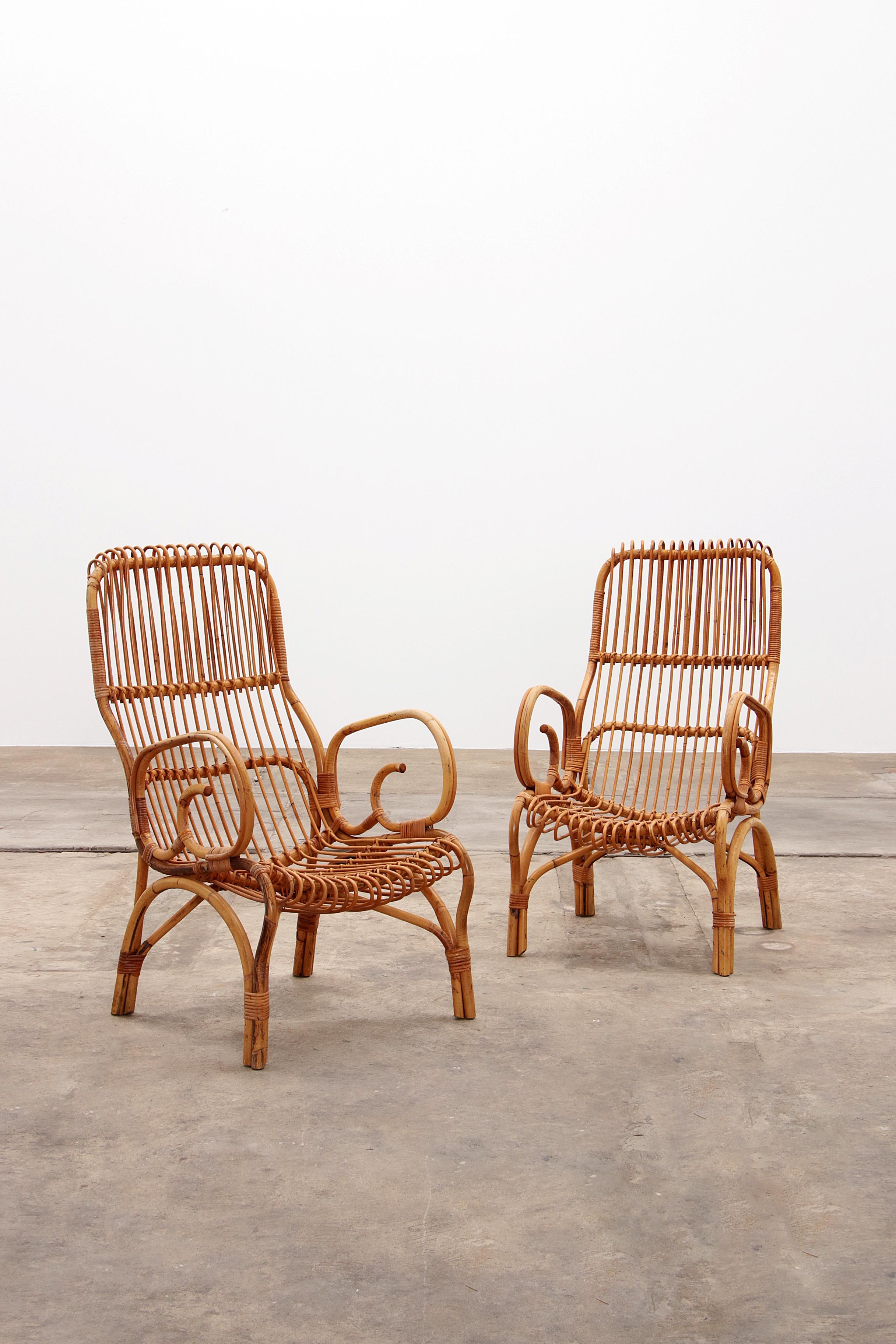 Vintage Italian rattan armchair by designer Franco Albini.

In very good vintage condition. Let the summer begin!

The first rays of the sun have already passed, so it's time for a summery interior.

This set of rattan chairs are in perfect