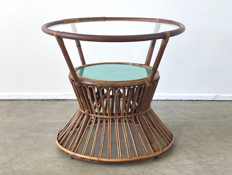 Italian bamboo side table with 2 tiers of concentric glass circles. 
Italy, 1950's.