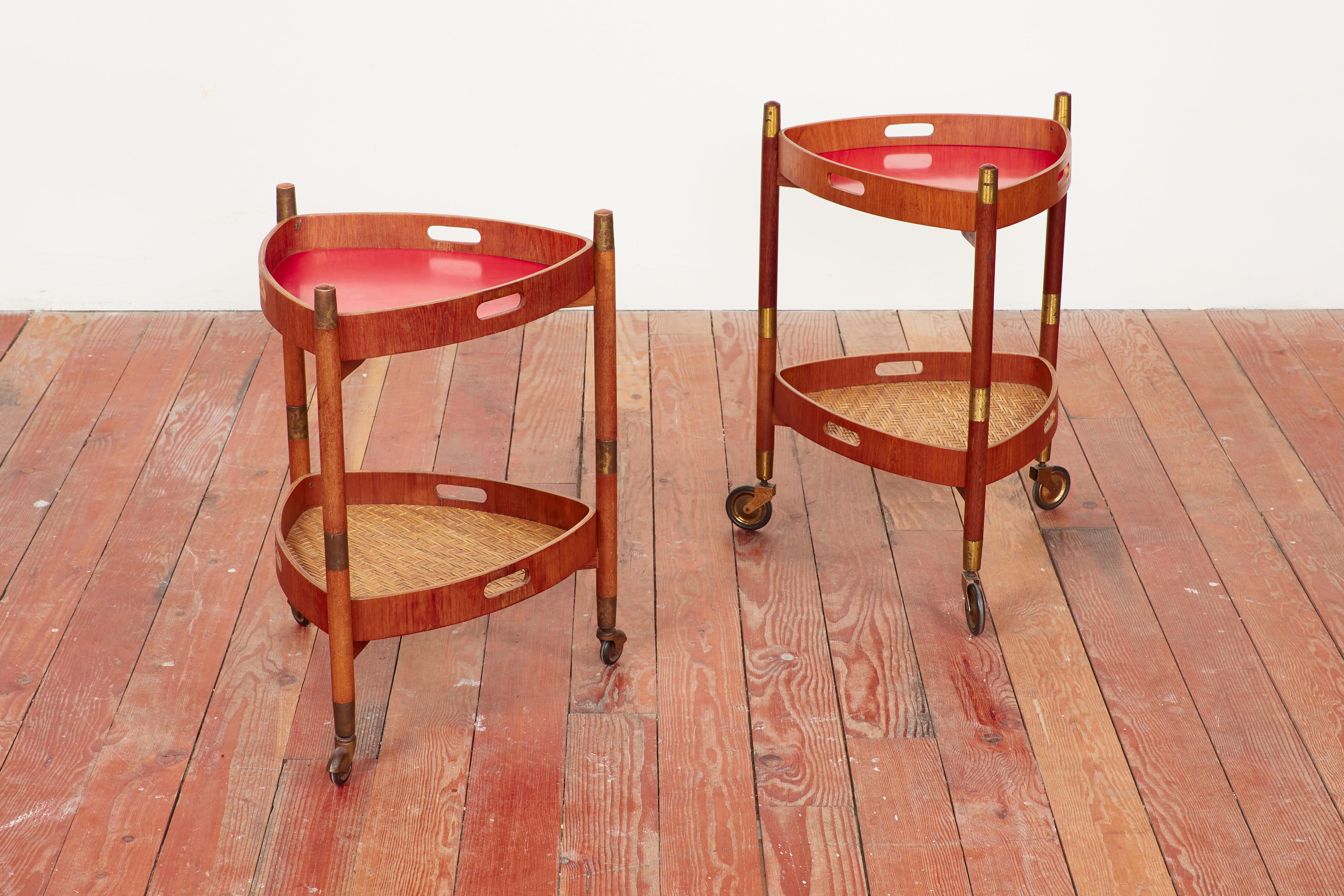 Pair of Italian wooden trolley barcarts with red laminate and woven bamboo trays, 1960s.
Top tray removes from bottom for serving purpose.

