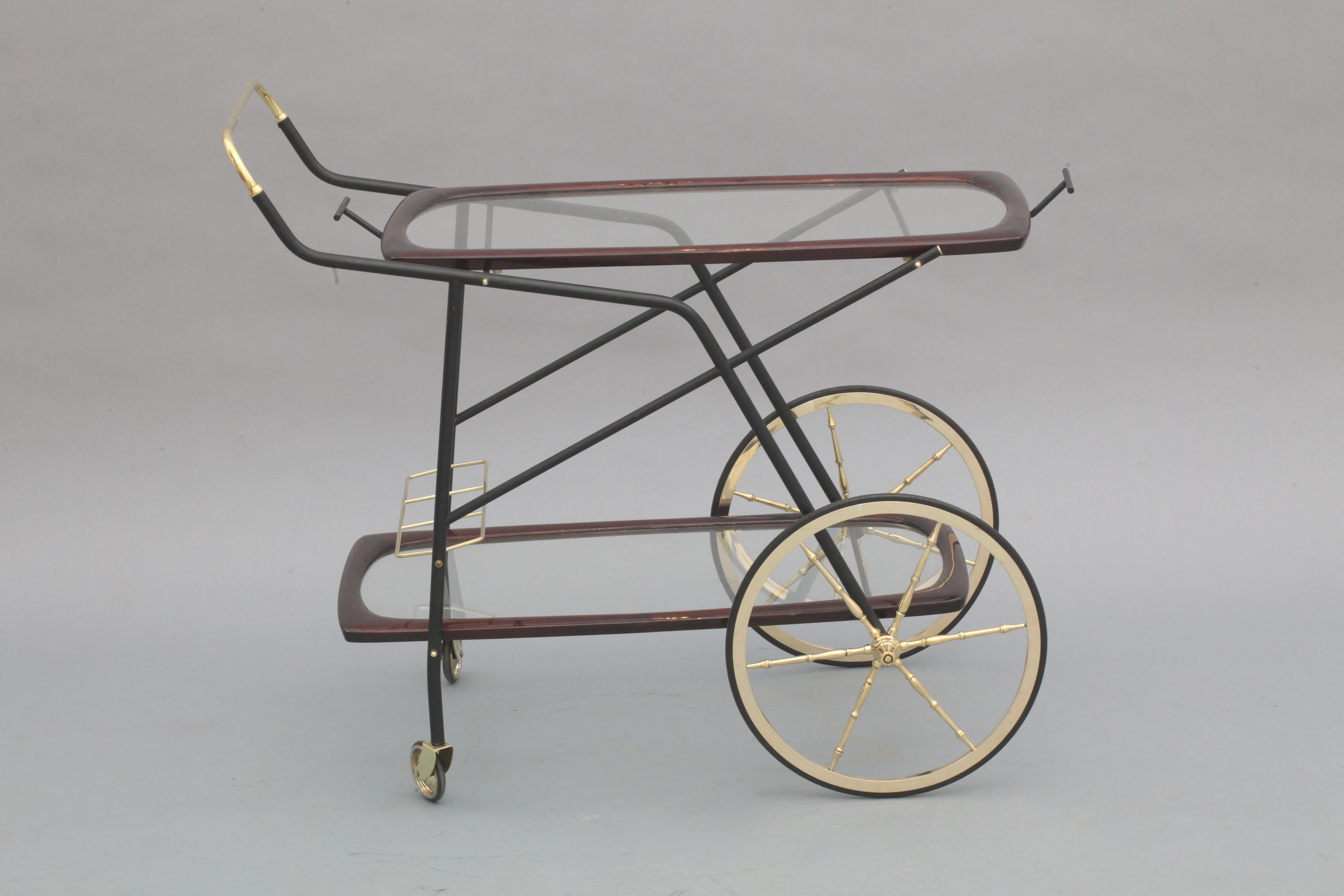 bar trolley,
Cesare Lacca,
Italy 1950,
Brass, wood
Serving tray and threee bottle holder.