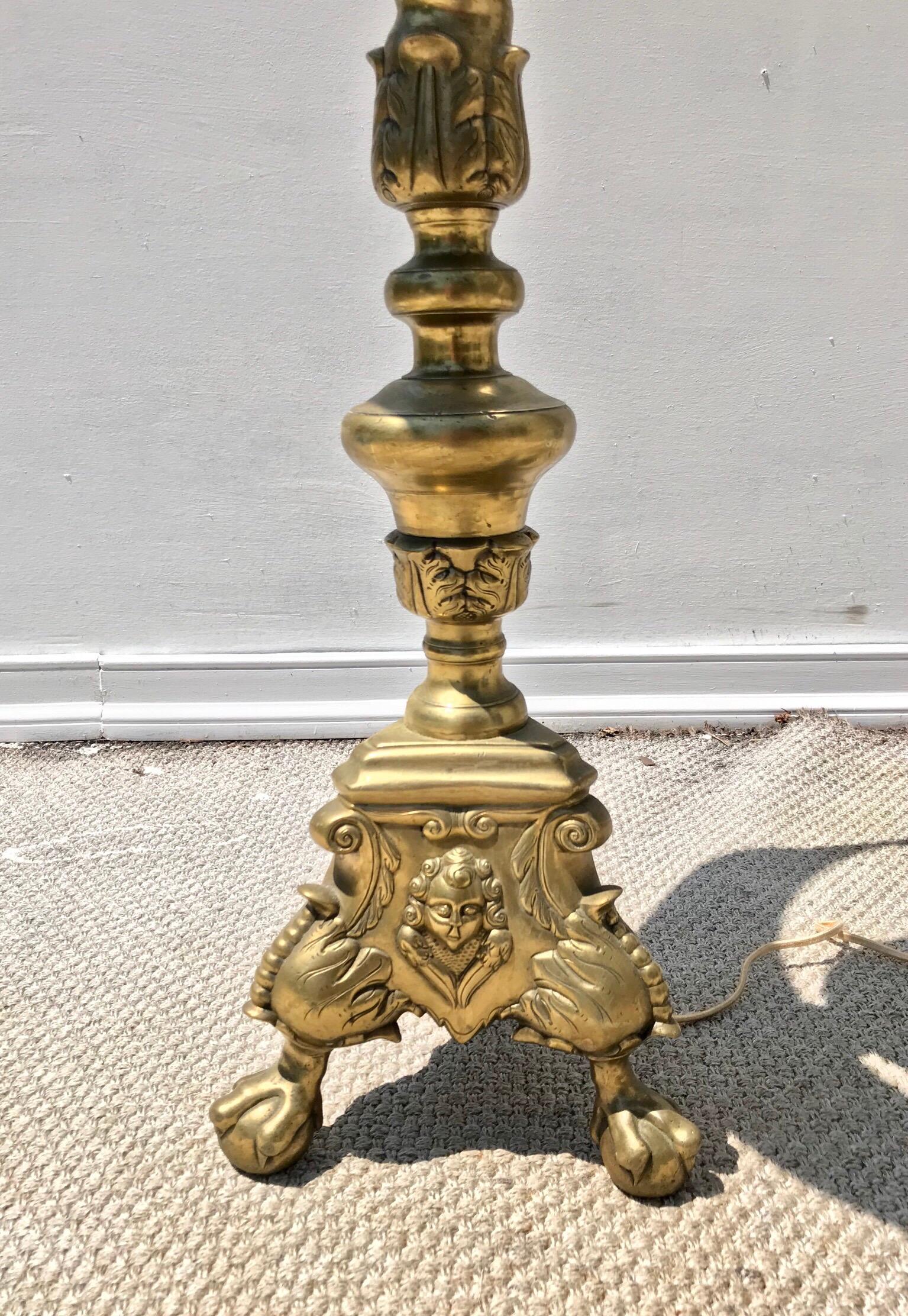 A fine and large-scale Baroque alter stick lamp of brass. Recently rewired and fitted with a double socket cluster in a patinated brass. The light sells and ships without the pictured shade.