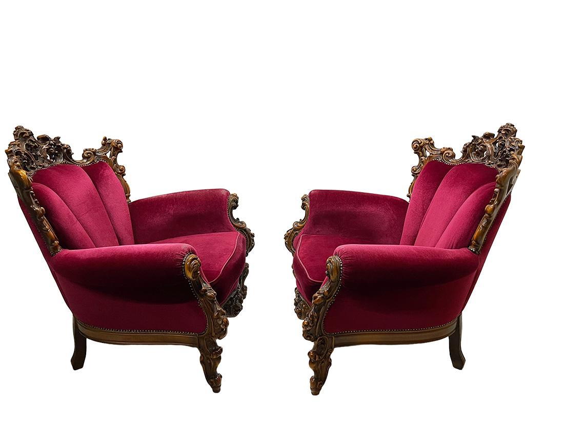Italian baroque armchairs, 1970s

Italian Baroque armchairs with colorful velvet. The pine wood in darker brown painted color with a motif of floral and scroll leaf pattern. The fabric and wood are little bit worn at the beginning of the armrest.
