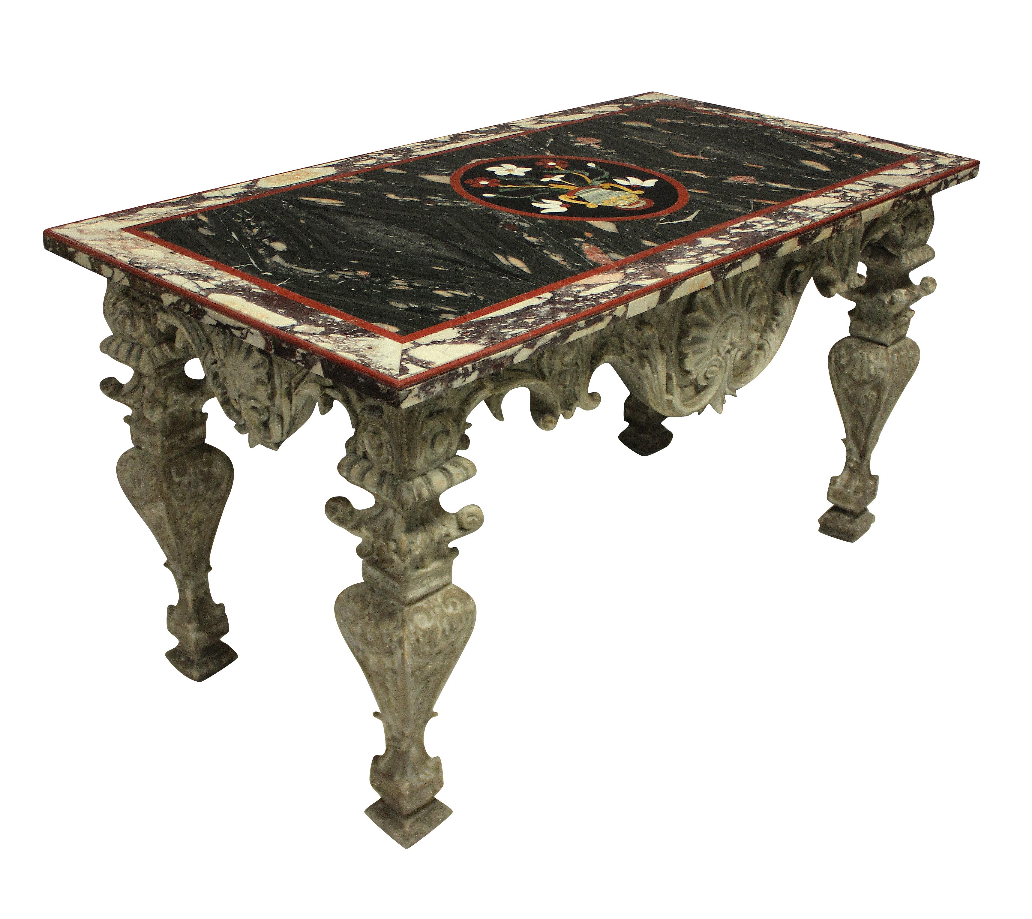 An Italian Baroque heavily carved and distressed painted walnut centre table. With shell and acanthus detailing throughout, supporting a Pietra Dura marble top. The top in various marbles and hardstones, with a shaped carnelian edge, with a central