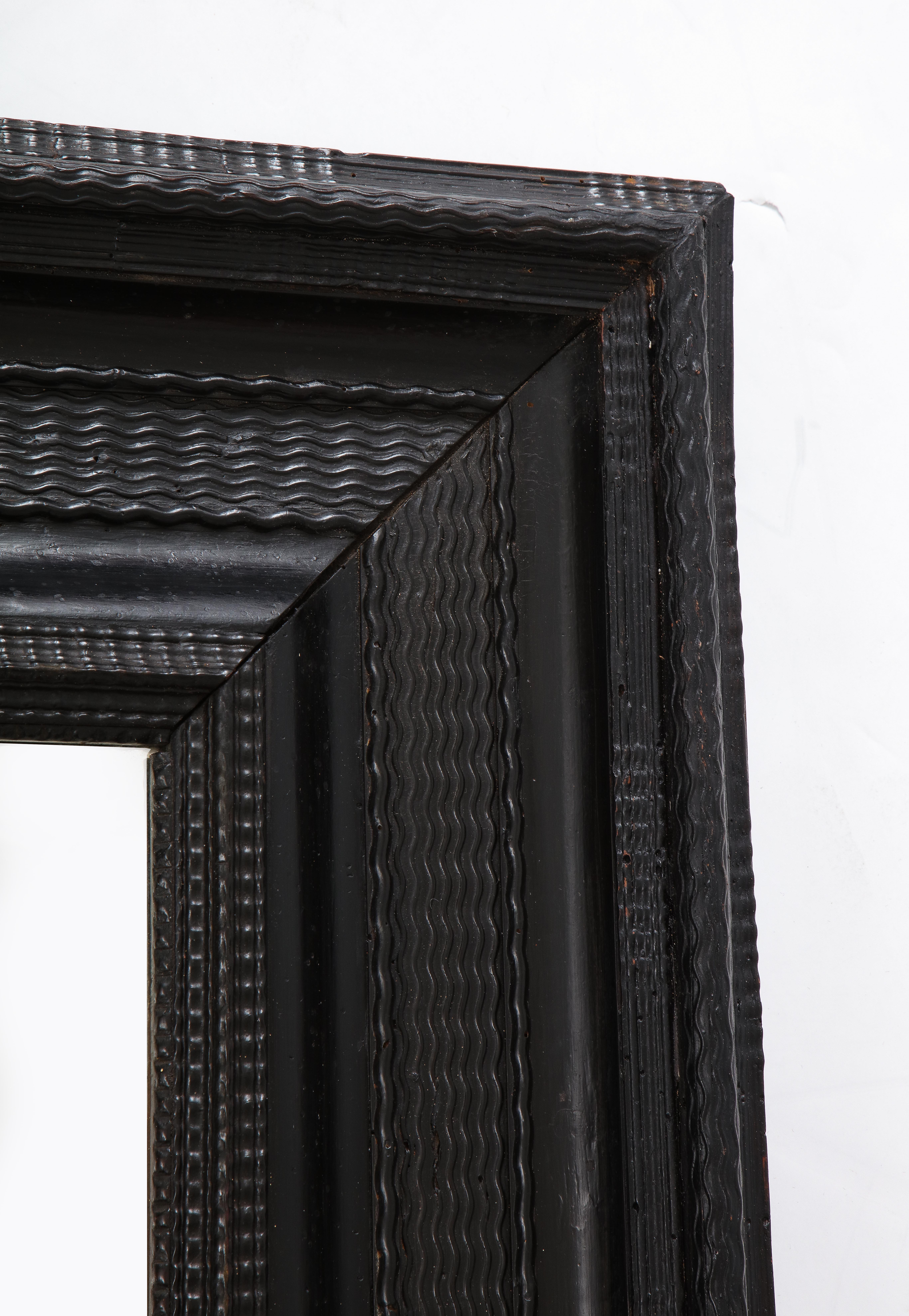 Hand-Carved Italian Baroque Carved Ebonized Frame/Mirror For Sale