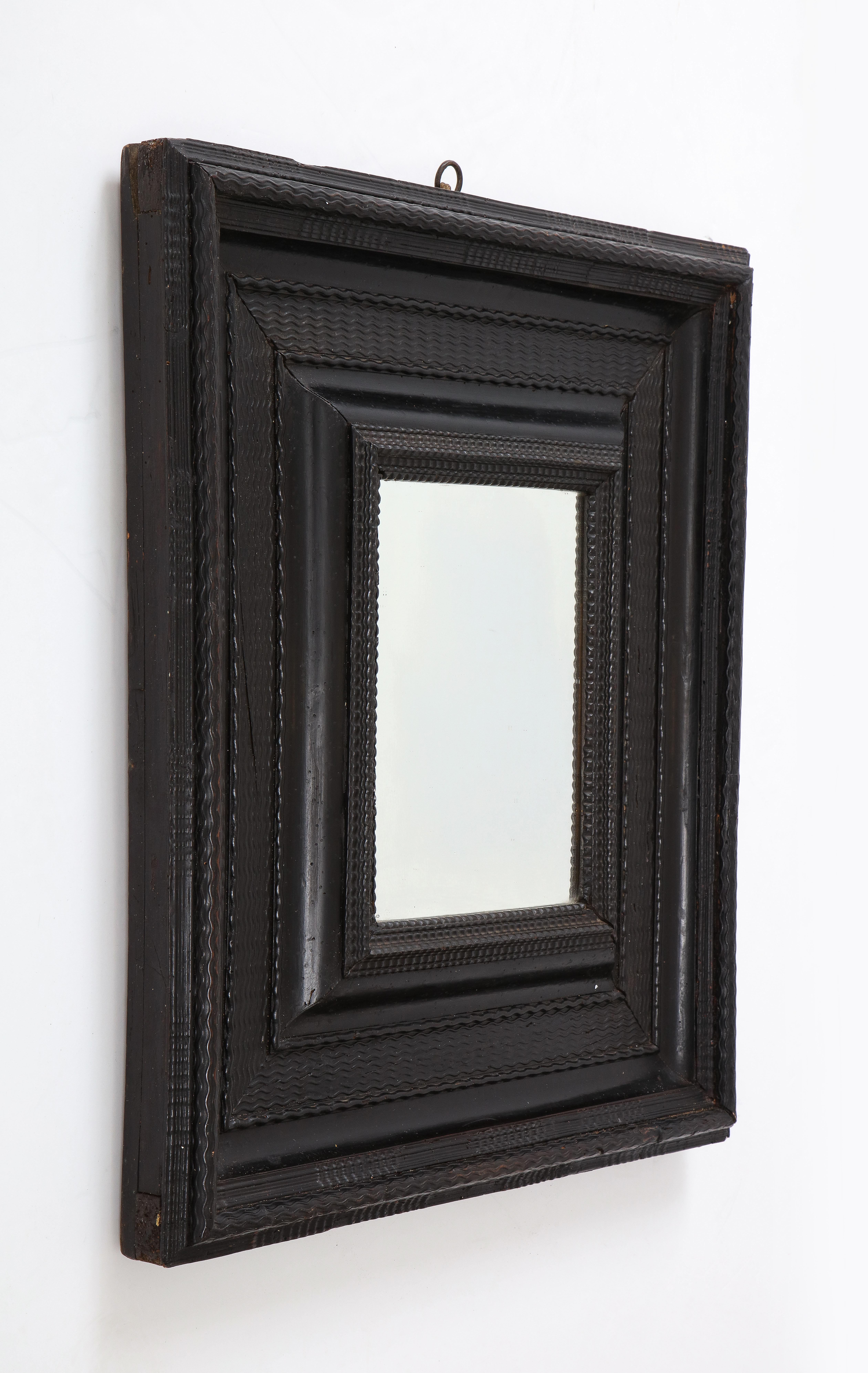 Late 17th Century Italian Baroque Carved Ebonized Frame/Mirror For Sale