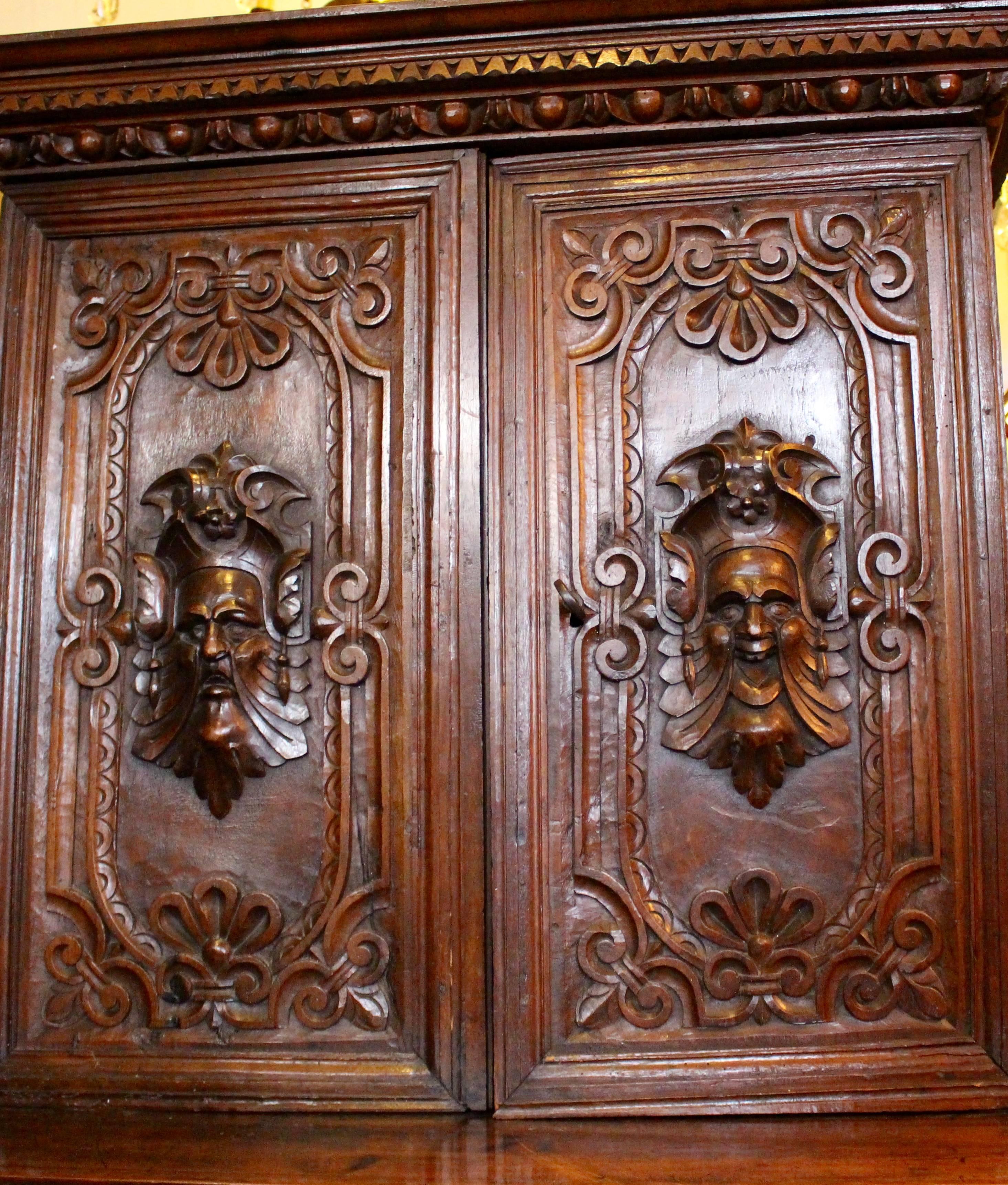Italian Baroque Carved Walnut Cupboard, 17th Century In Fair Condition For Sale In Heathfield, East Sussex