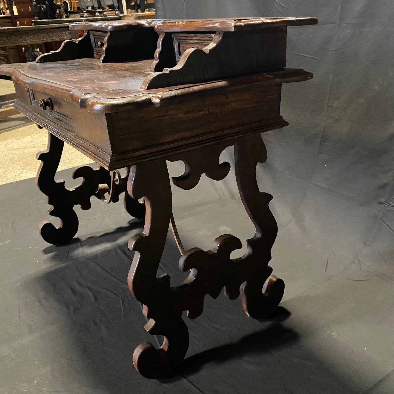 Early 19th Century Italian Baroque Carved Walnut Writing Desk with Lyre Base For Sale