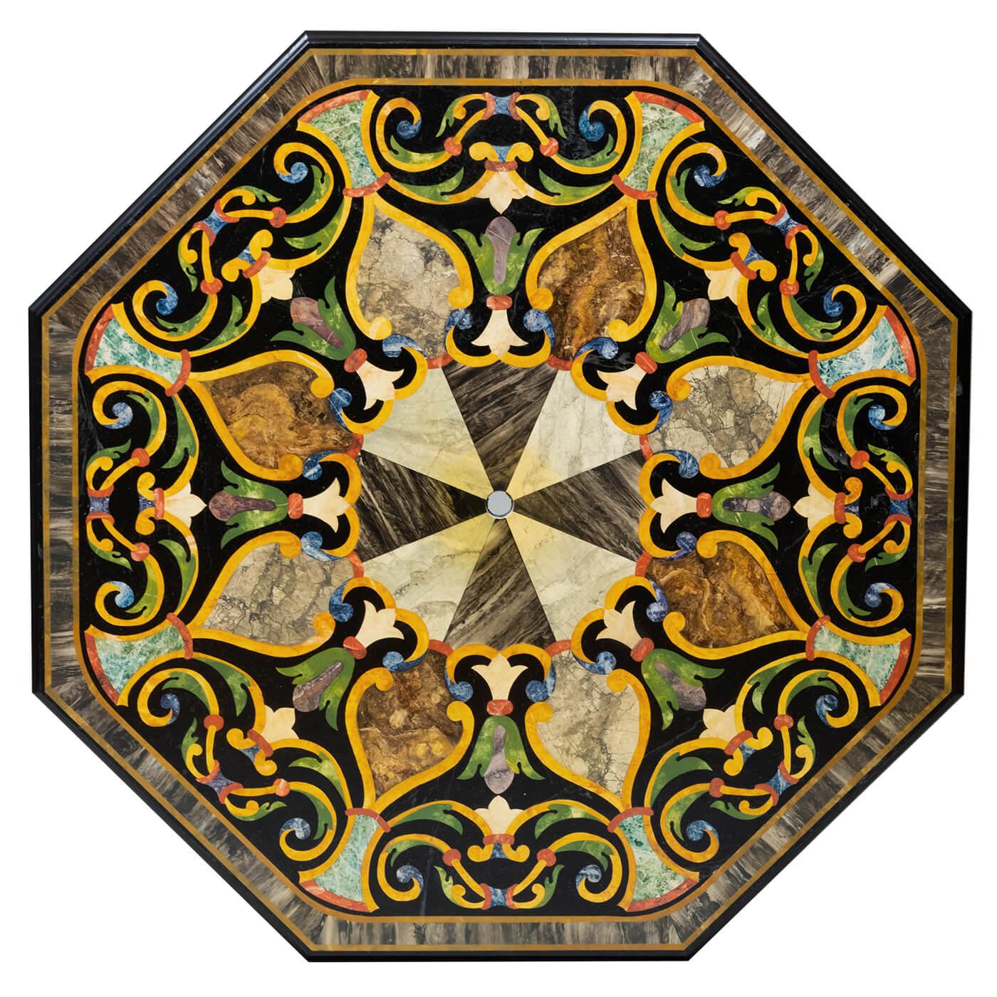 An Italian Baroque style octagonal center table with a hand-painted scagliola top, with a molded edge, hand-painted and ebonized decoration on the satinwood base raised on ball feet. 

20th-century reproduction. 

Dimensions: 57