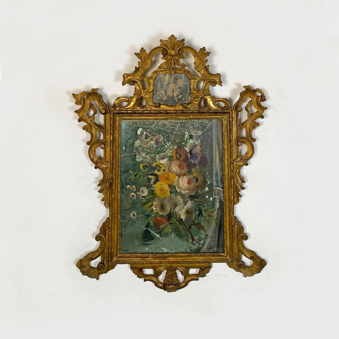 Italian baroque decorative mirror with gilt frame and painted, late eighteenth century.
Medium size mercury baroque decorative mirror with gilt frame, painted after breaking the glass.
Dating back to the end of the 18th century but decorated in