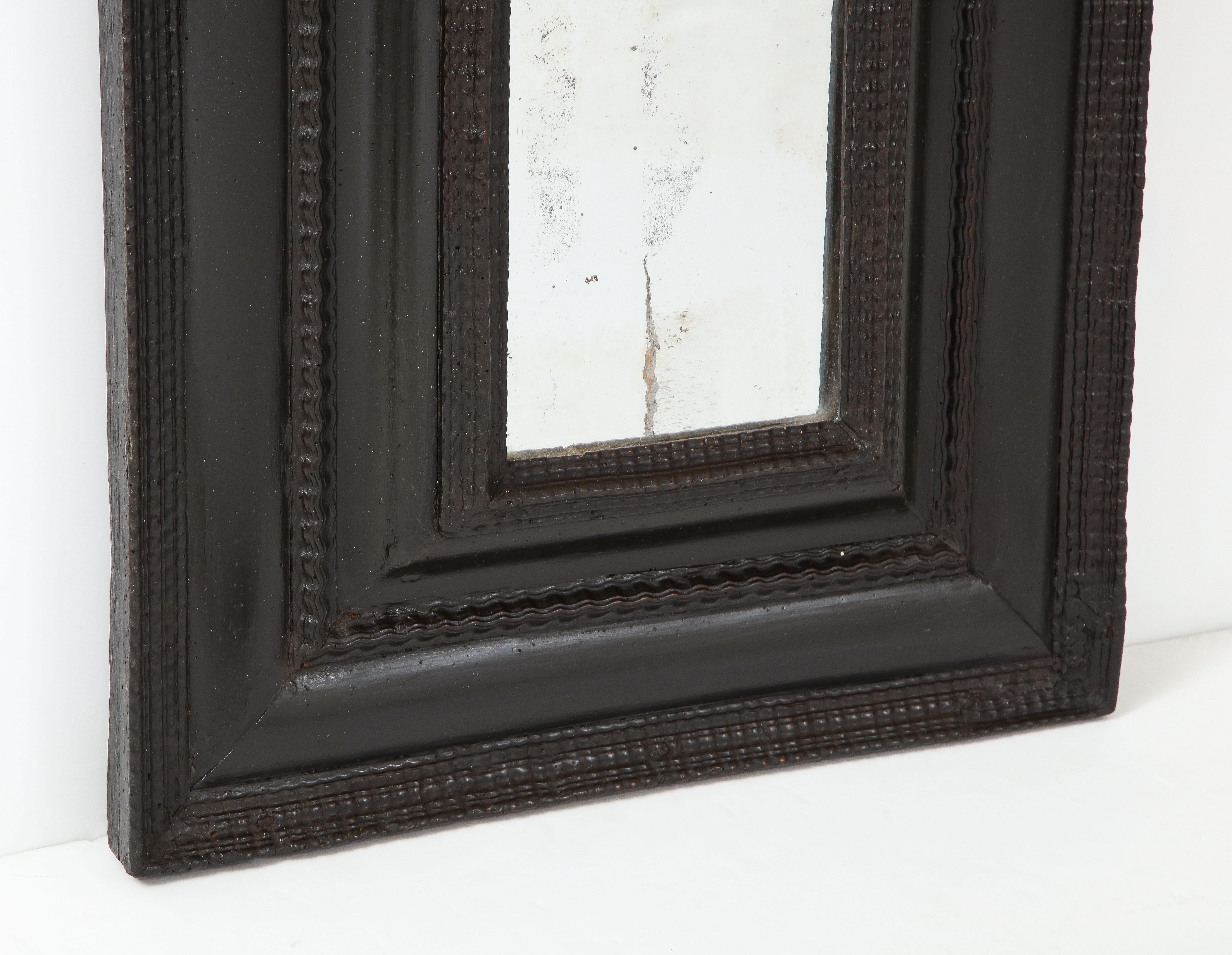 18th Century and Earlier Italian Baroque Ebonized Walnut Guilloché Frame, Inset with Old Mercury Glass For Sale