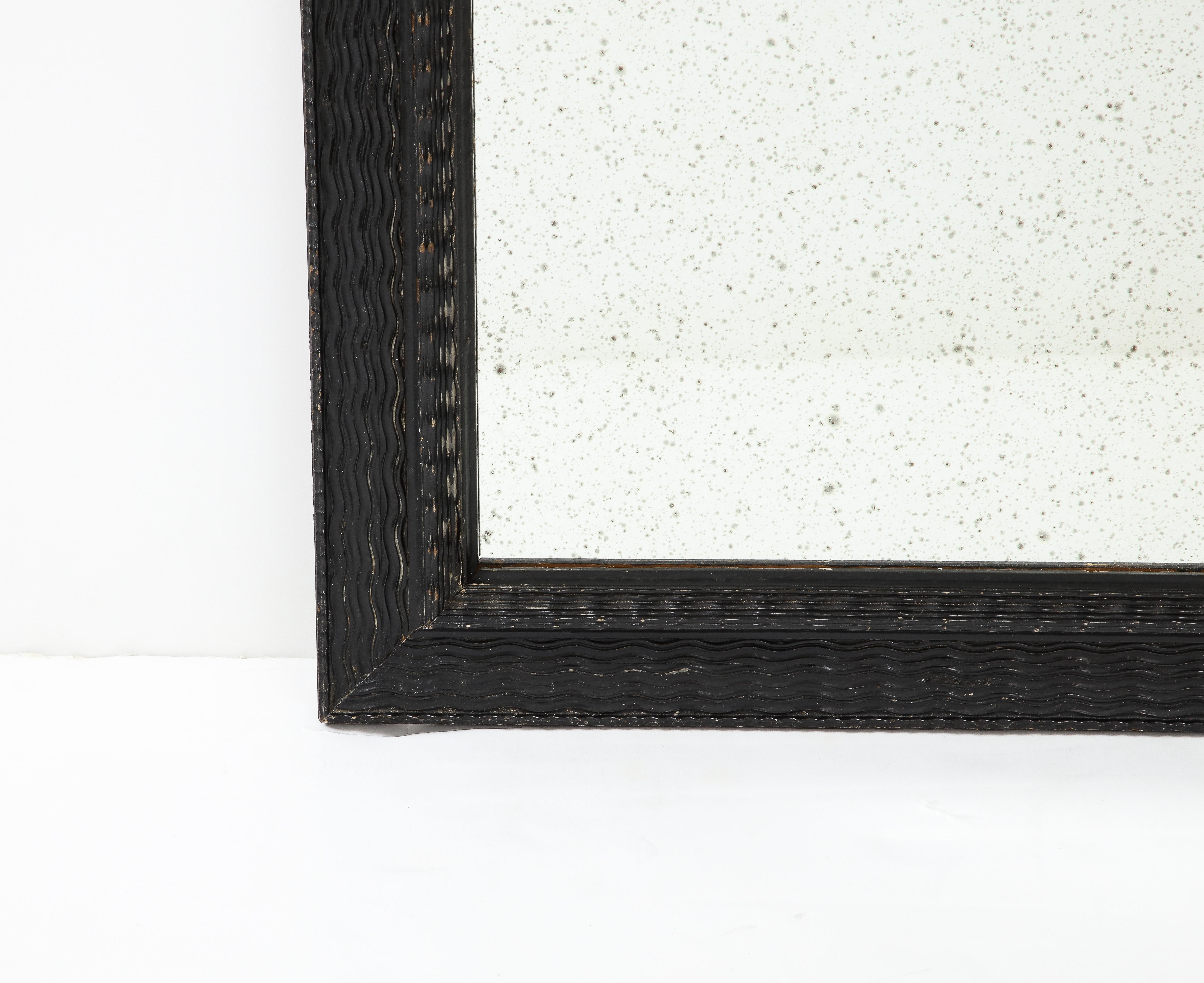 Early 20th Century Italian Baroque Manner Ebonized and Ripple Carved Mirror Frame, circa 1900 For Sale