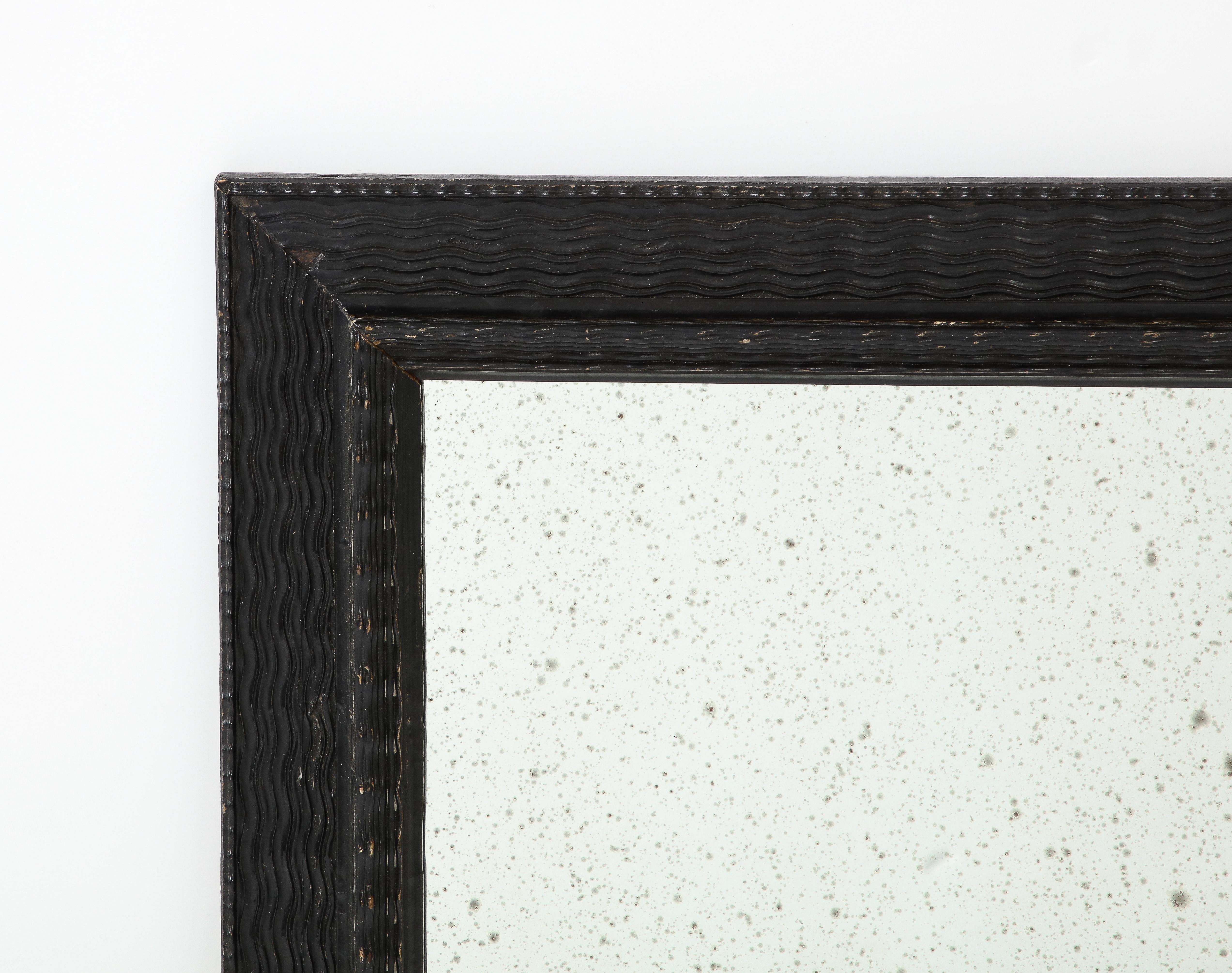 Glass Italian Baroque Manner Ebonized and Ripple Carved Mirror Frame, circa 1900 For Sale