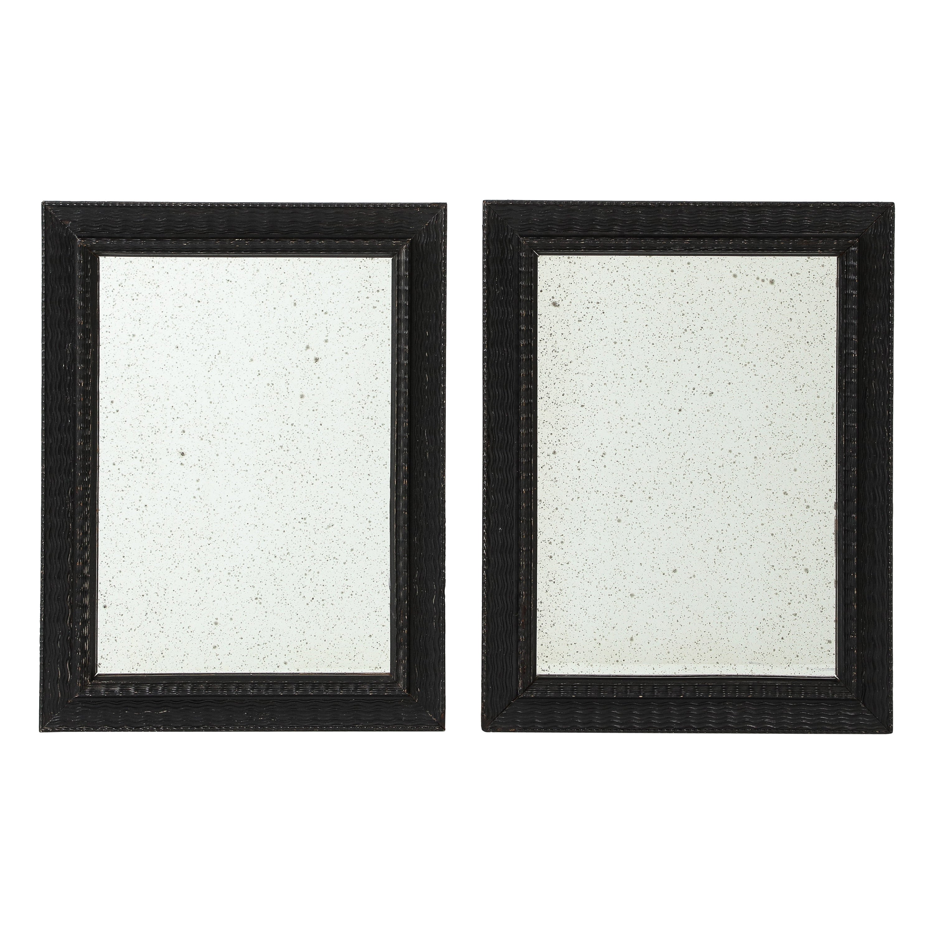 Cadre de miroir italien de style baroque, ébonisé et sculpté d'ondulations, vers 1900 en vente