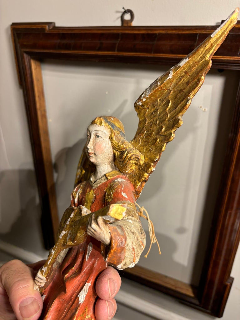 Italian Baroque Painted and Gilt Wood Winged Angel Playing a Violin Italian Baroque Painted and Gilt Wood Winged Angel Playing a Violin