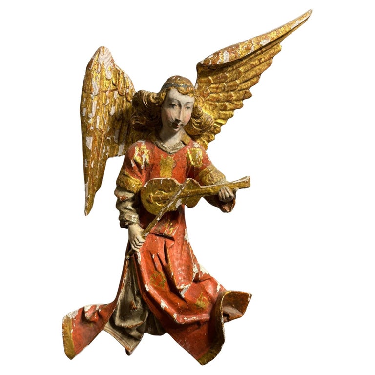 Italian Baroque Painted and Gilt Wood Winged Angel Playing a Violin Italian Baroque Painted and Gilt Wood Winged Angel Playing a Violin