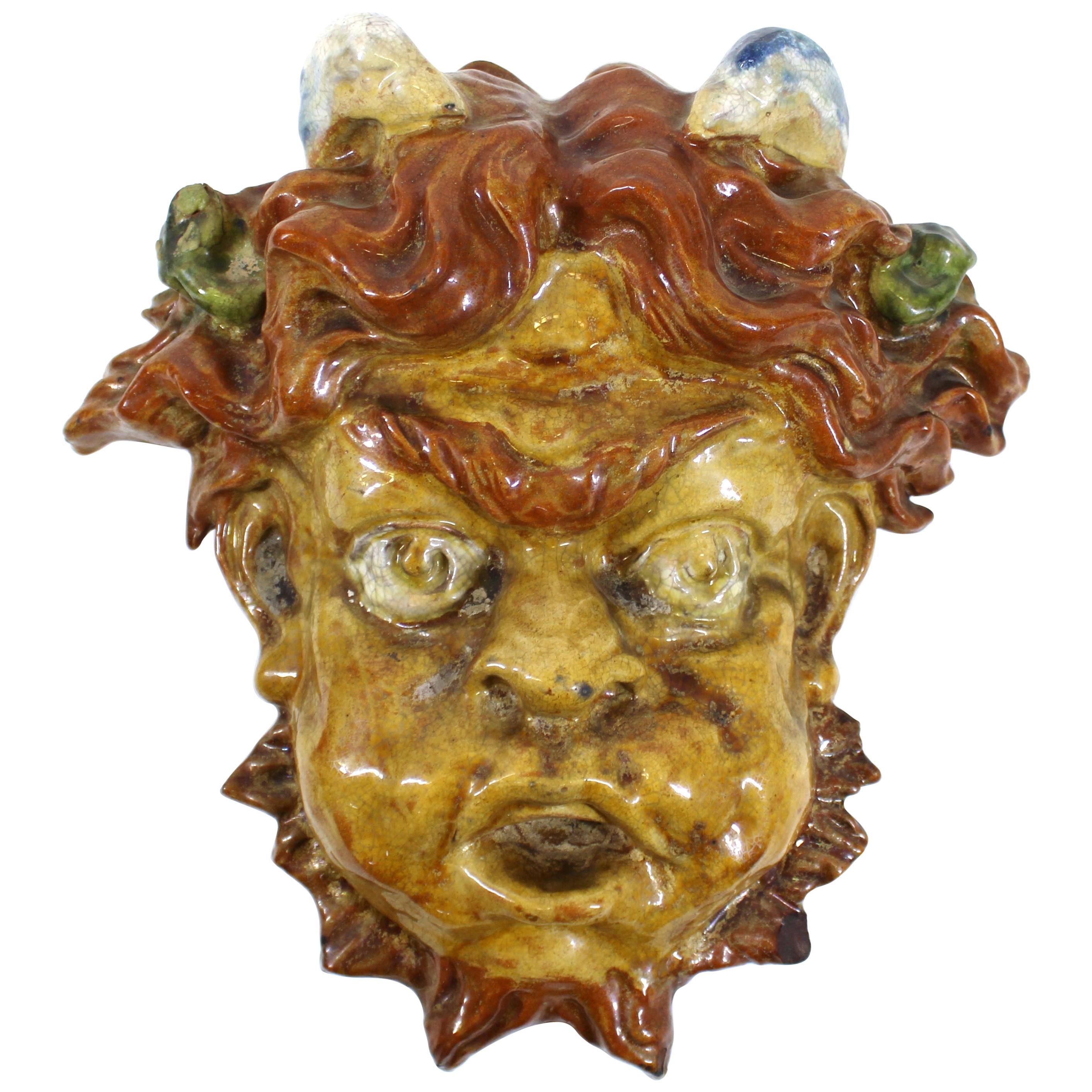 Italian Baroque Revival Glazed Terracotta Puck Mask For Sale