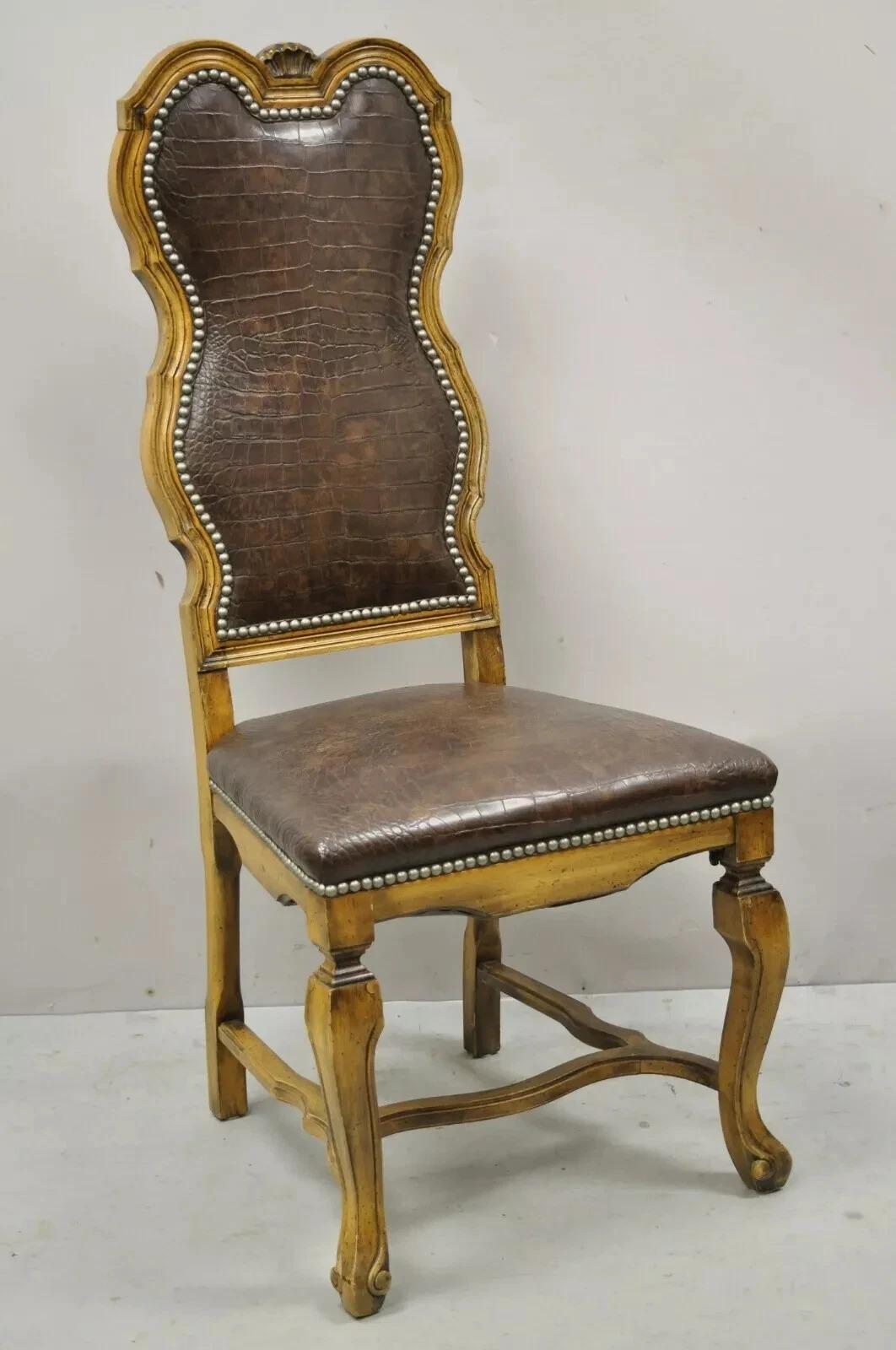 Italian Baroque Rococo Style Carved Wood Brown Reptile Print Dining Chairs - Set of 4.  Listing includes 4 side chairs with brown faux reptile printed upholstery, nail head trim, stretcher base, solid wood frame, distressed finish and nicely carved