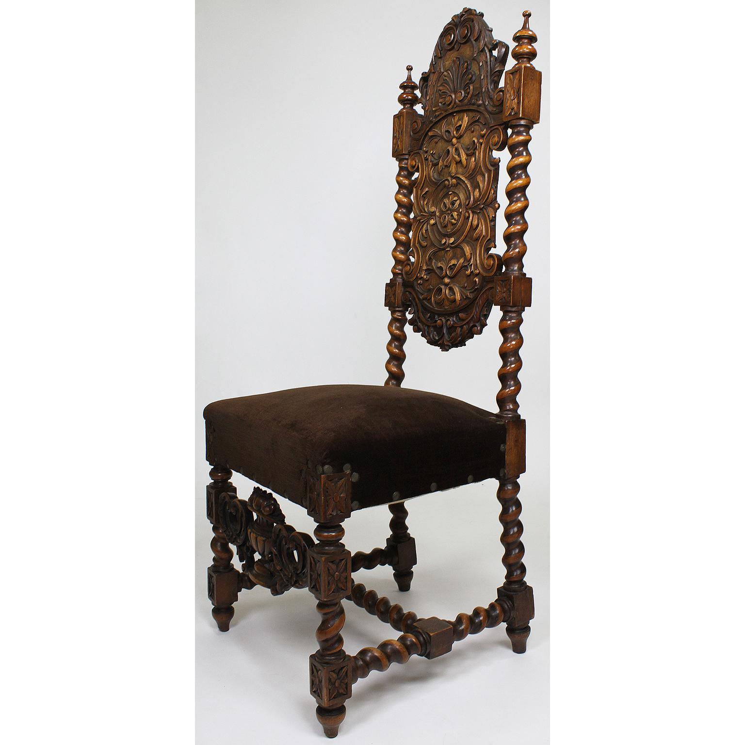 An Italian 19th-20th century Baroque Revival Solomonic style carved walnut side chair. The slender carved backrests flanked by scrolled carved columns, raised on similar quad-legs with carved urn and fruit cross-banded apron, circa
