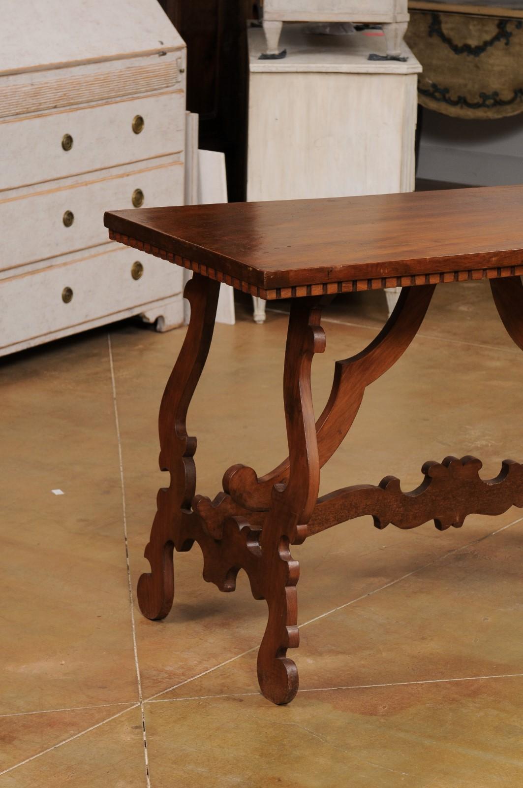 Carved Italian Baroque Style 20th Century Walnut Fratino Table with Lyre Shaped Base For Sale