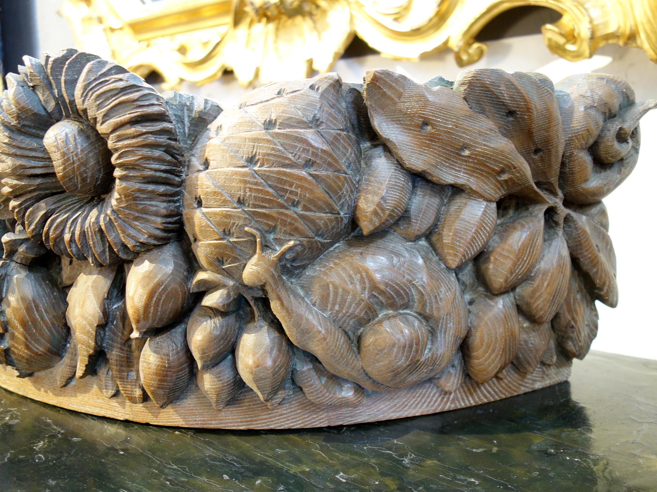 19th century Italian Baroque style ornately solid carved capital frieze element with florals & foliage. Arc-shaped old chestnut with highly developed bronze-like patina from aging. Recognized in the classical architecture of Ancient Greece and Rome,