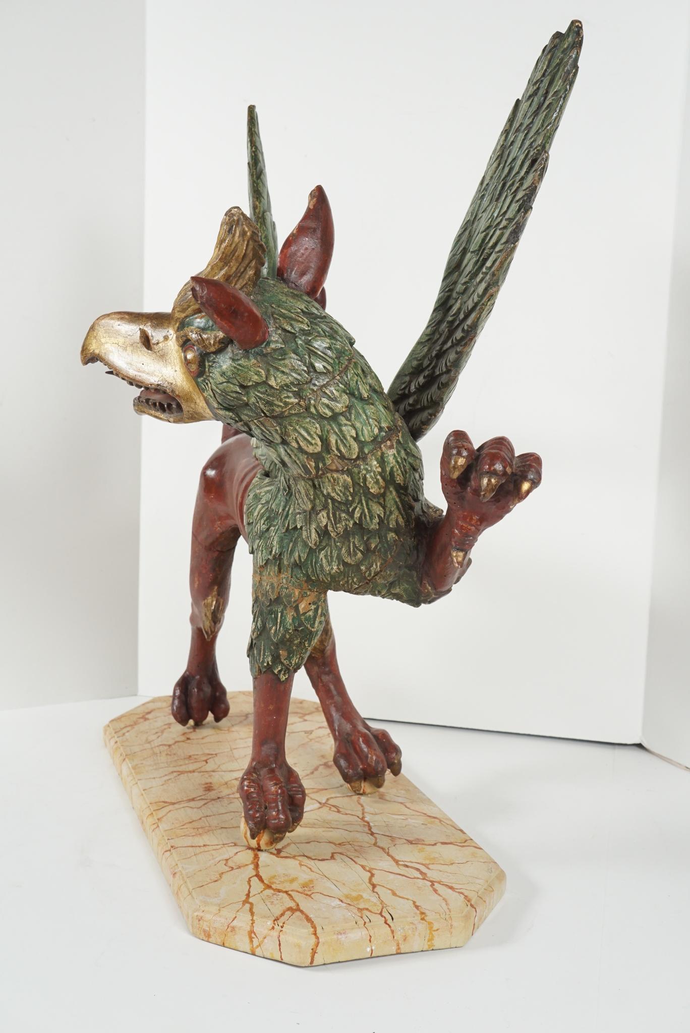 Italian Baroque Style Carved, Painted and Gilded Wood Figure of a Griffon In Good Condition For Sale In Hudson, NY