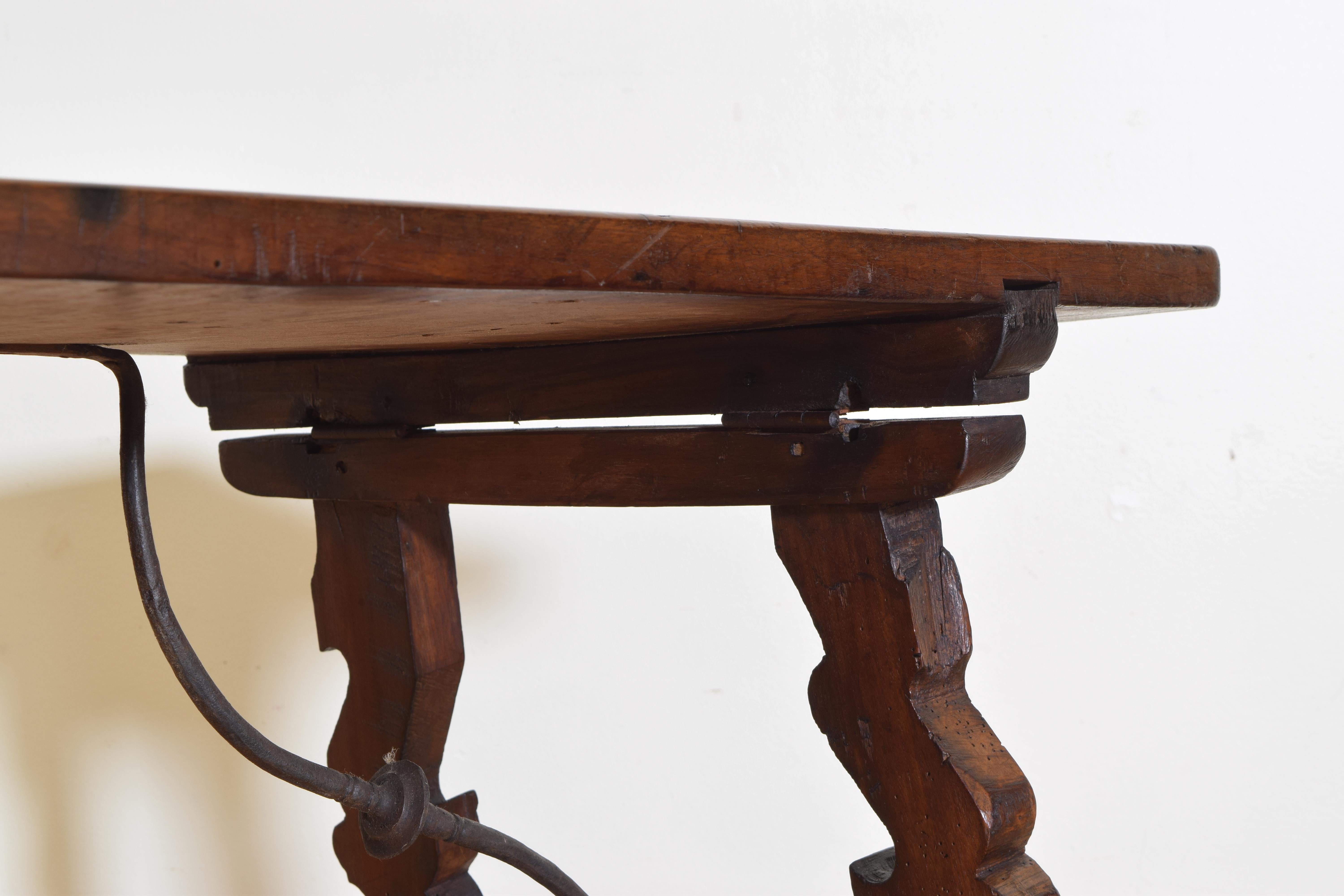 Late 19th Century Italian Baroque Style Carved Walnut and Wrought Iron Trestle Coffee Table