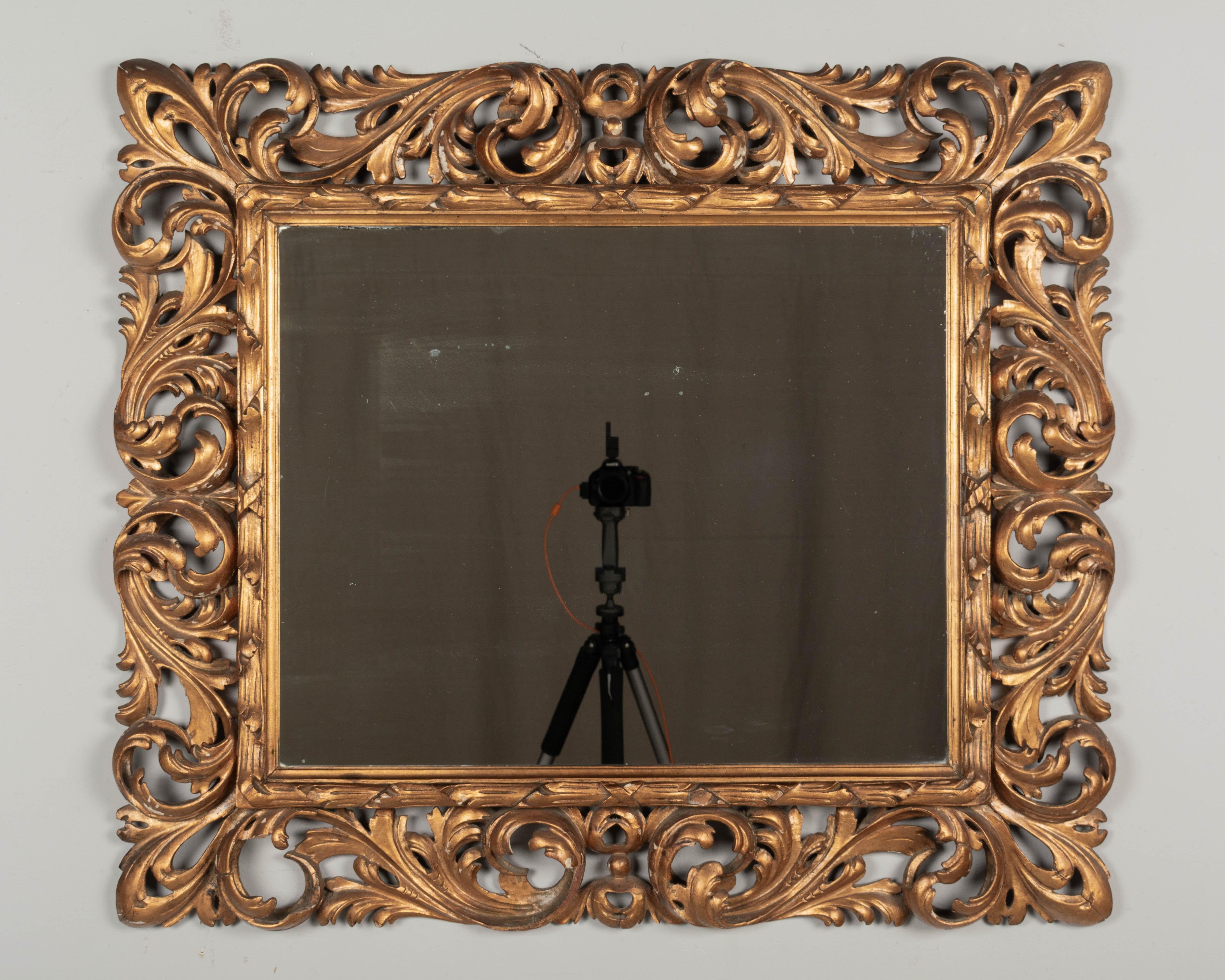 Hand-Crafted Italian Baroque Style Gilded Mirror For Sale