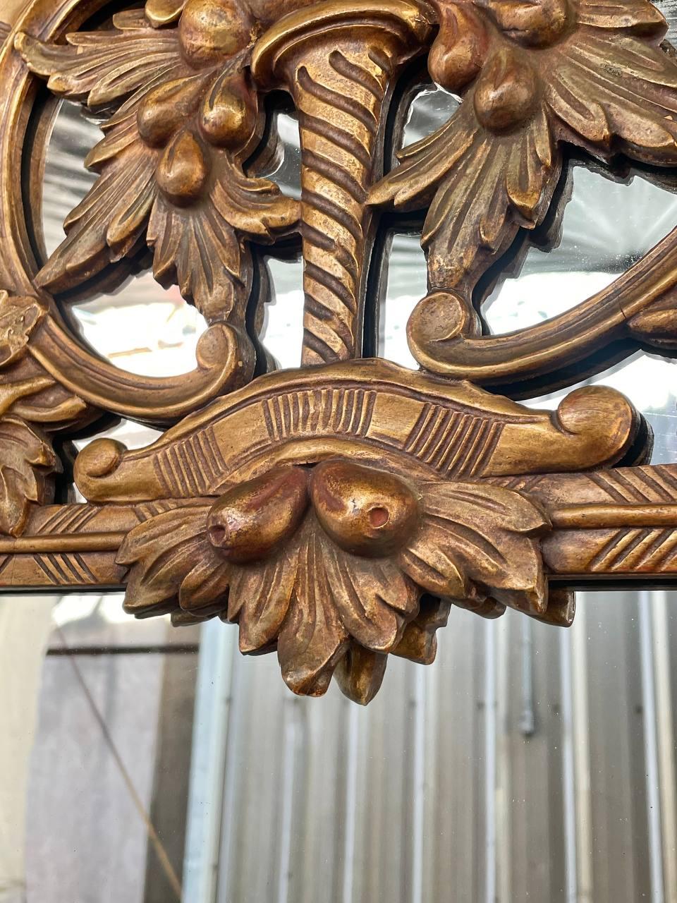 Mid-20th Century Italian Baroque Style Giltwood Mirror with a Carved Grape & Vine Motif For Sale