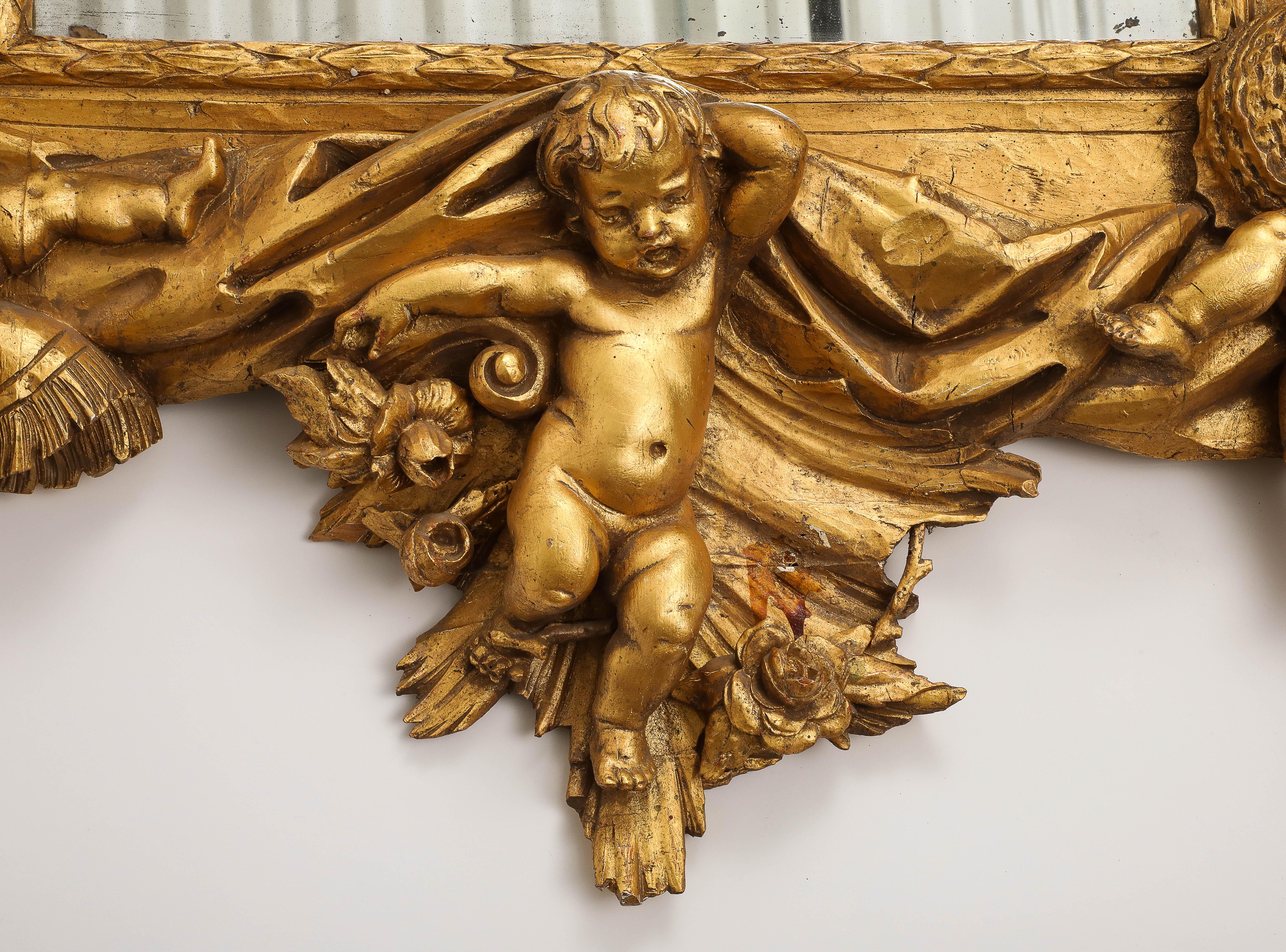 20ième siècle Miroir mural en bois doré de style baroque italien en vente