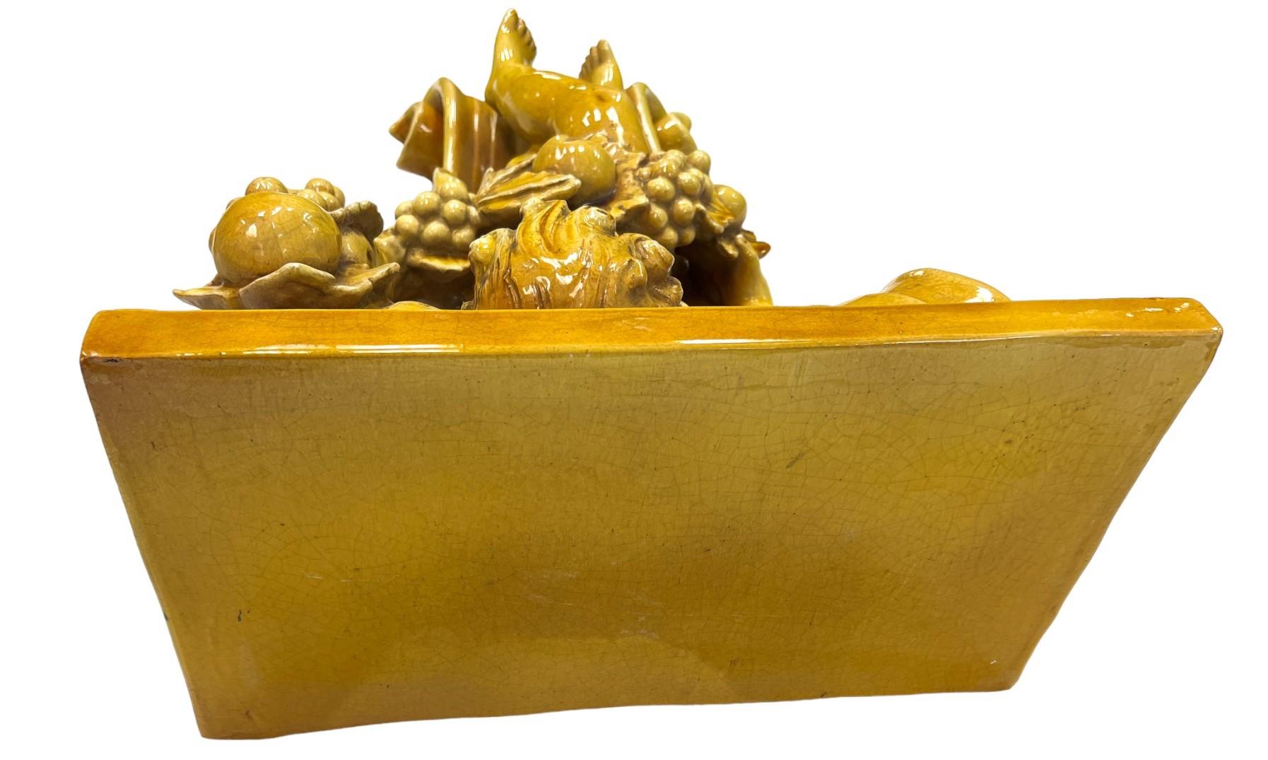 Early 20th Century Italian Baroque-Style Glazed Pottery Putto Wall Bracket For Sale