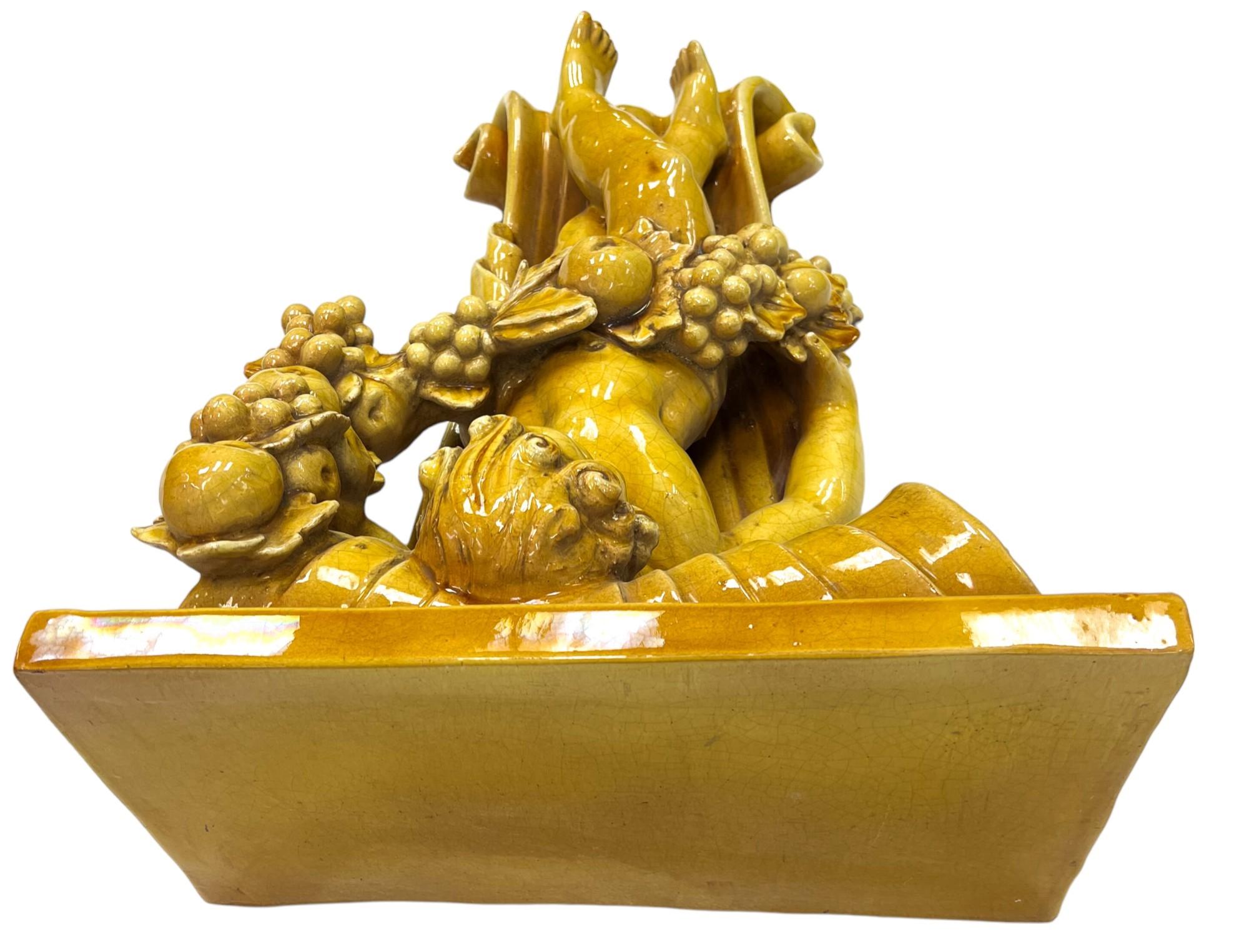 Italian Baroque-Style Glazed Pottery Putto Wall Bracket In Good Condition For Sale In North Palm Beach, FL