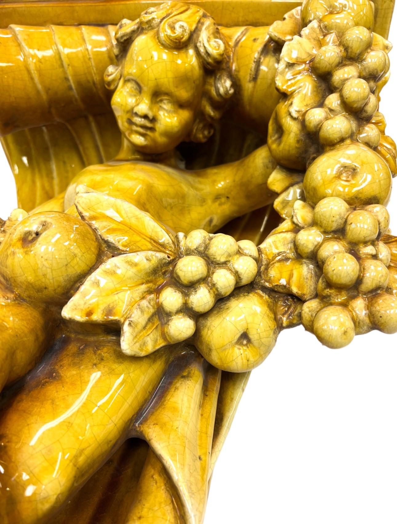 Ceramic Italian Baroque-Style Glazed Pottery Putto Wall Bracket For Sale