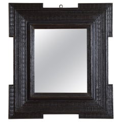 Italian Baroque Style Guilloche Carved and Ebonized Mirror, Late 19th century