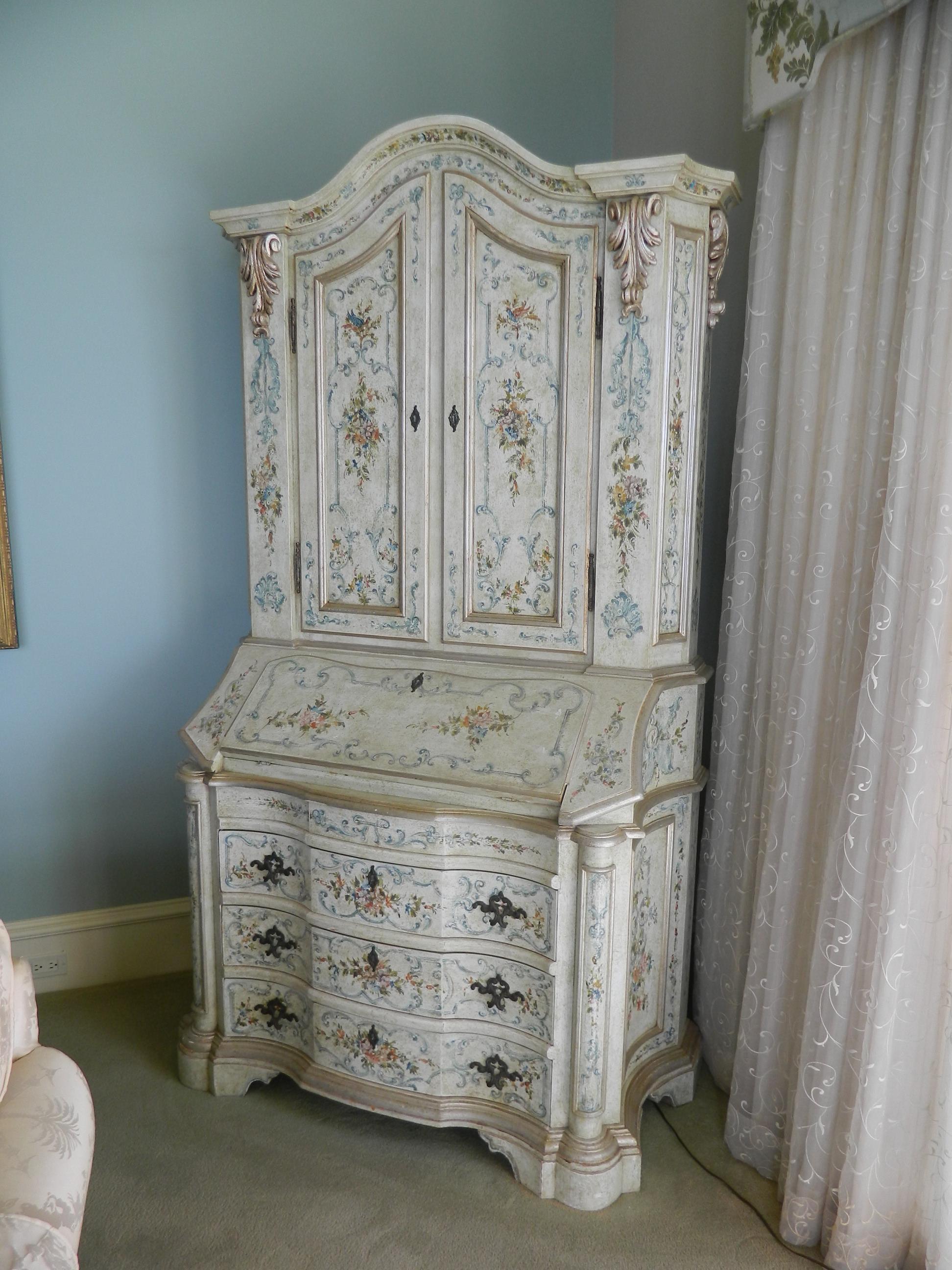 Mid-20th century Italian Baroque style painted secretary with display cabinet, pull-out desk and three drawers. Decorative items inside cabinet are not included.