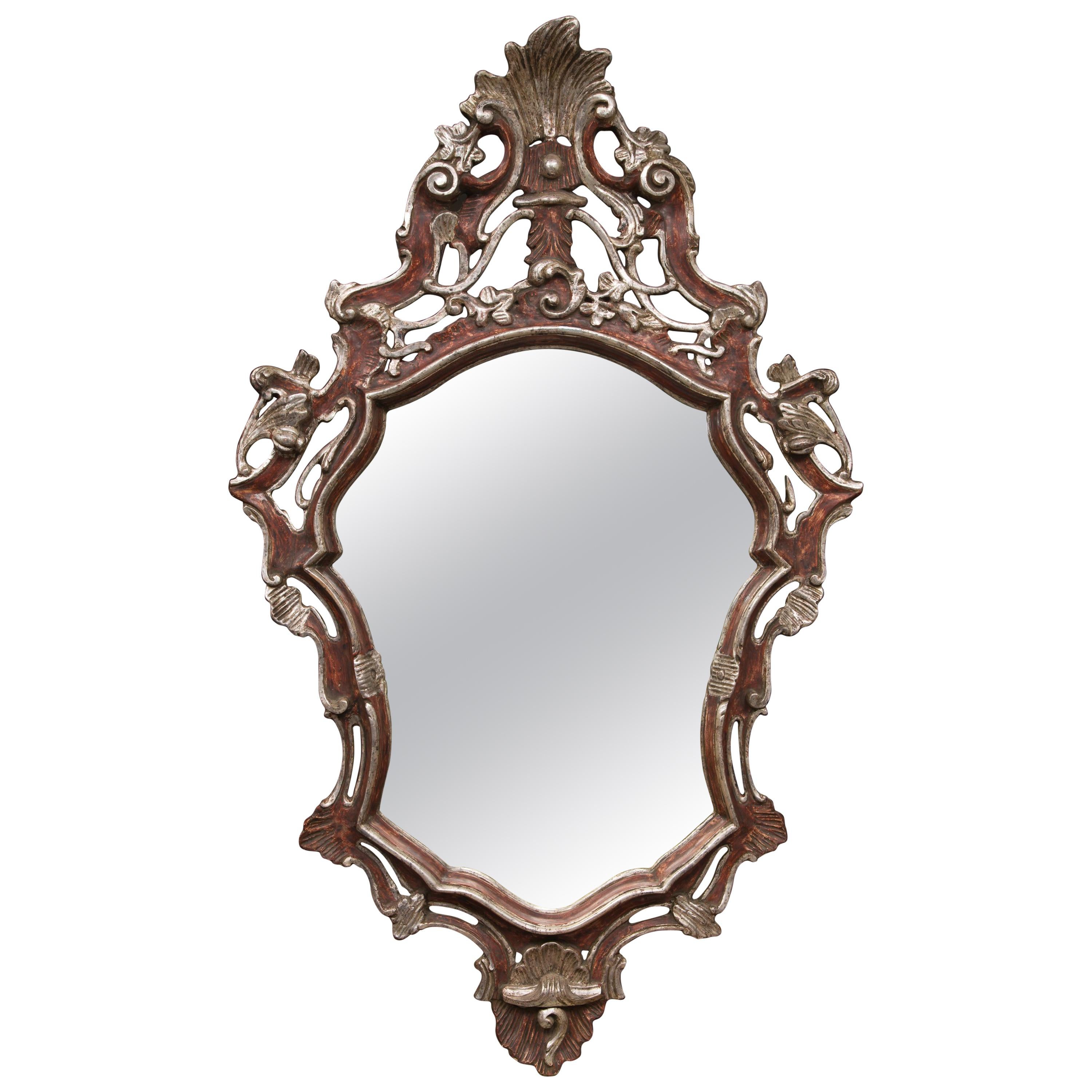 Miroir mural de style baroque italien en argent doré