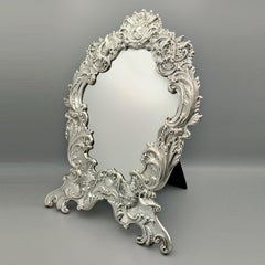 Italian Baroque style table mirror in 800 solid silver with velvet back.