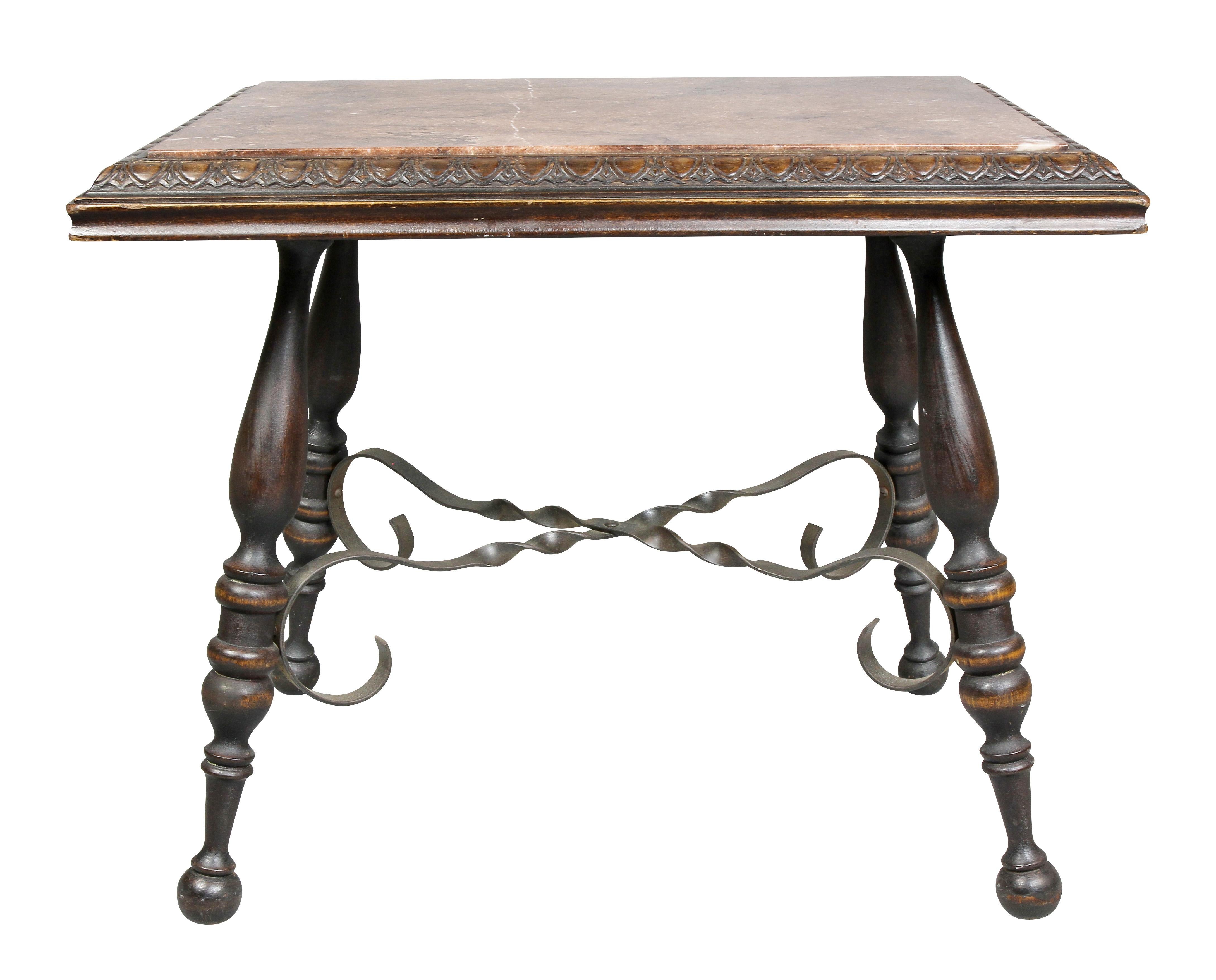 With inset marble top with carved egg and dart border raised on turned legs and metal stretchers.