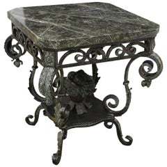 Table en fer forgé de style baroque italien avec plateau en marbre